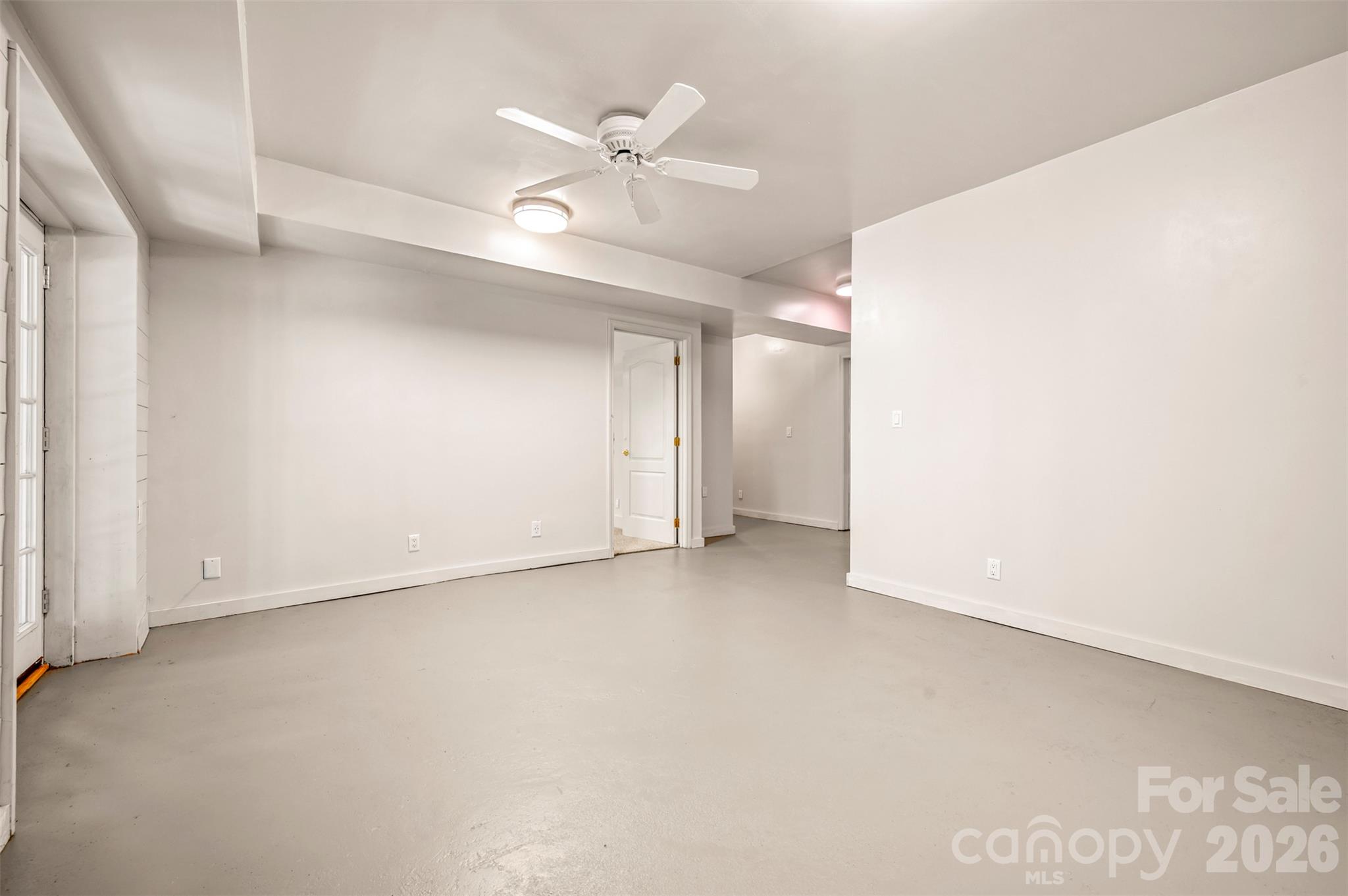 View 2 of basement family room. Door to right to 4th bedroom - 600 John Weaver Road, Columbus