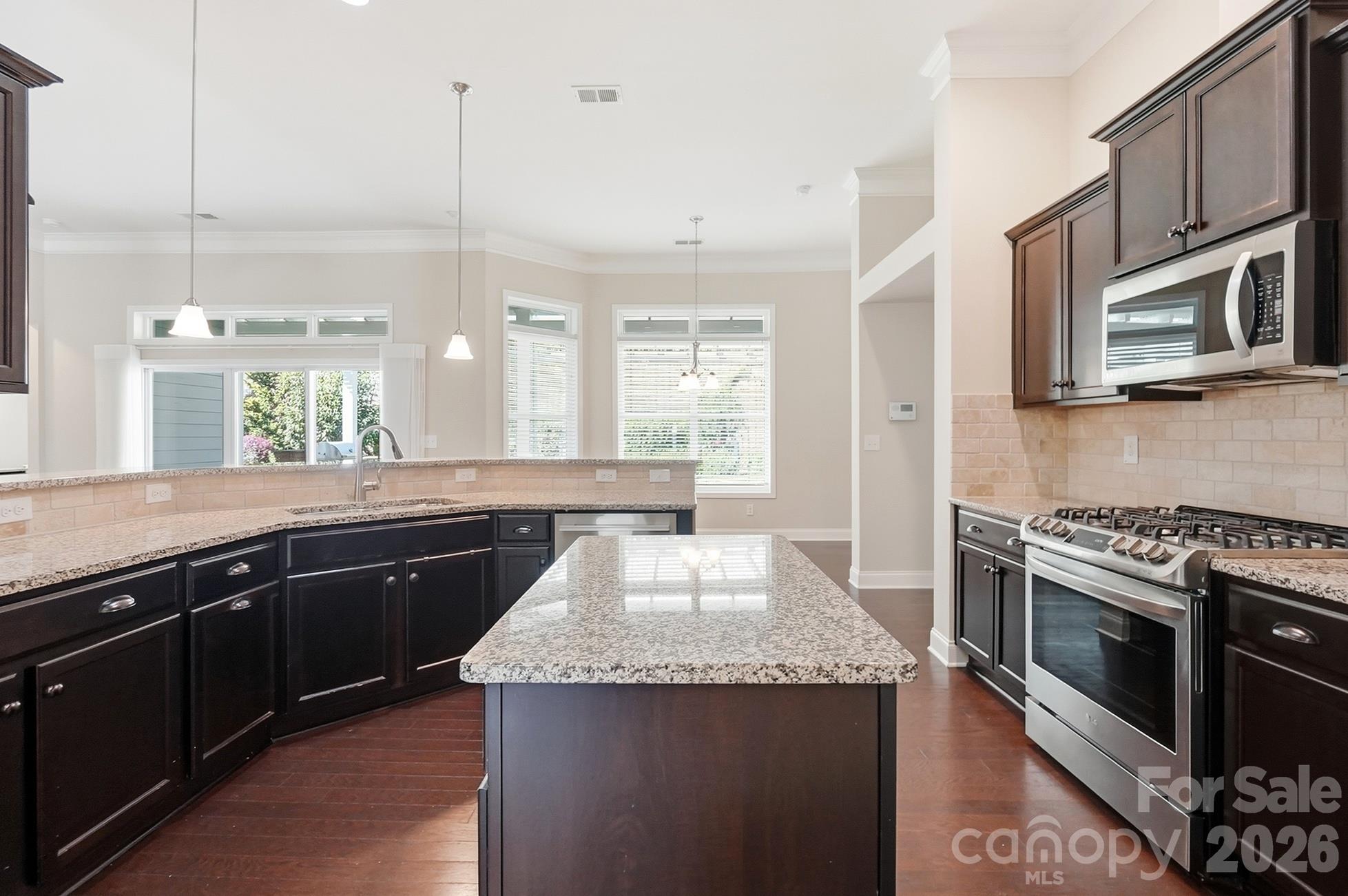 Spacious kitchen with granite counters, ss appliances, gas range - 9106 Longvale Lane, Charlotte