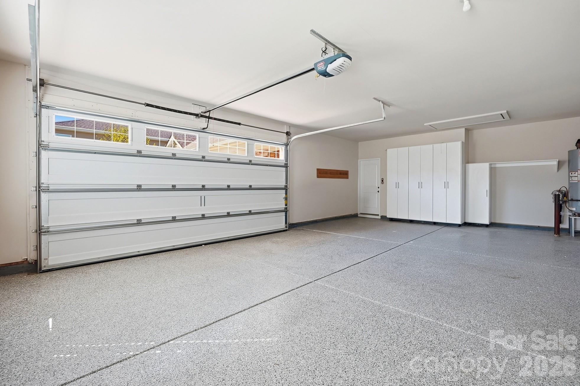 New garage doors, epoxy flooring - 9106 Longvale Lane, Charlotte