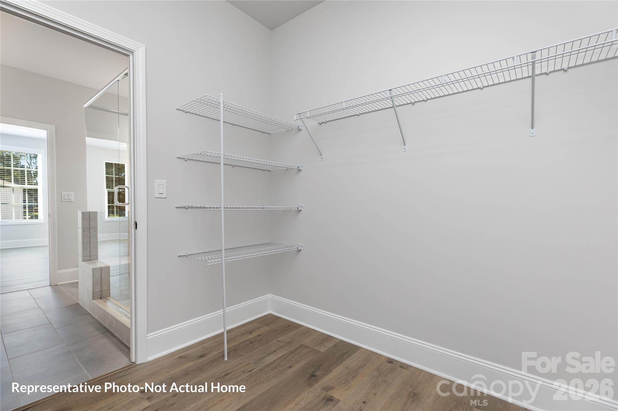 Main Bedroom Closet-Merlot - 10233 Rainier Trail Drive NW, Huntersville