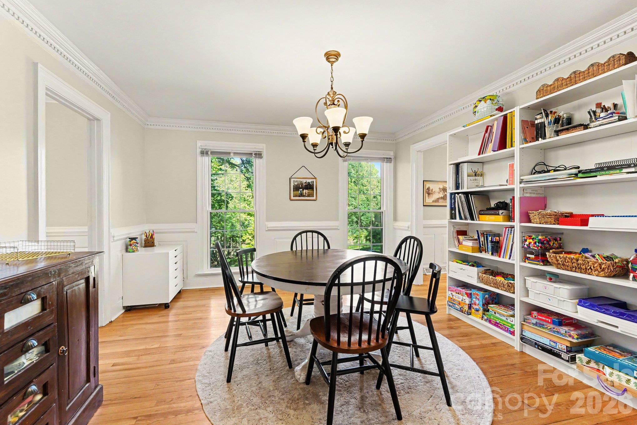 Classic moldings and abundant light create an elegant dining space for everyday meals and special gatherings - 607 Anderson Avenue, Salisbury