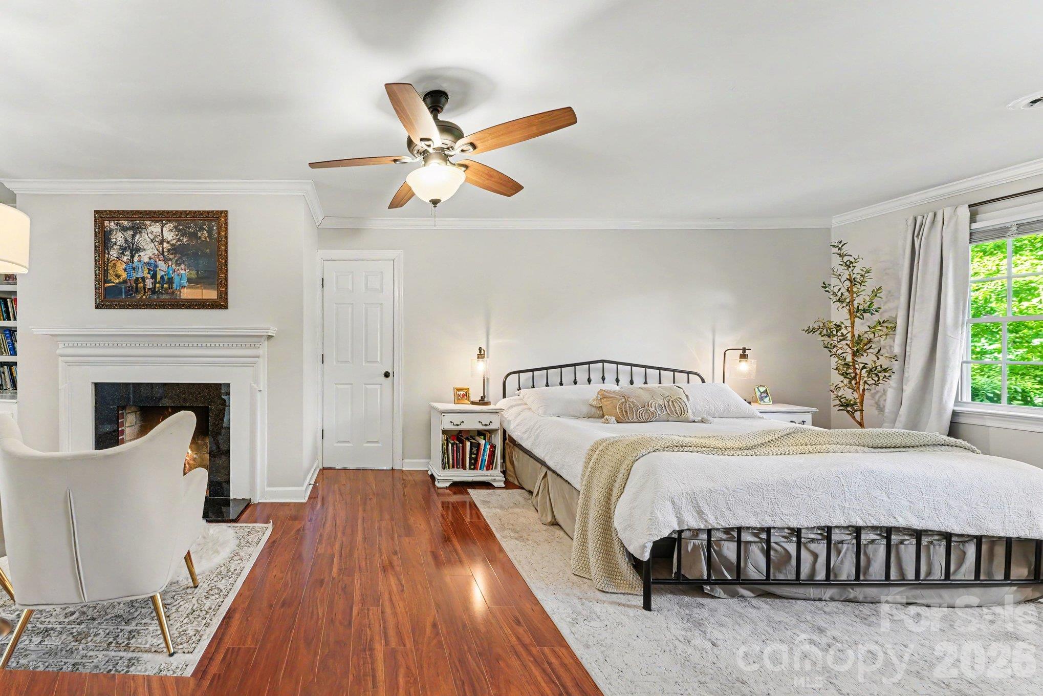 Exceptional upstairs primary suite with a fireplace, walk in closets, ensuite bath, and laundry. - 607 Anderson Avenue, Salisbury
