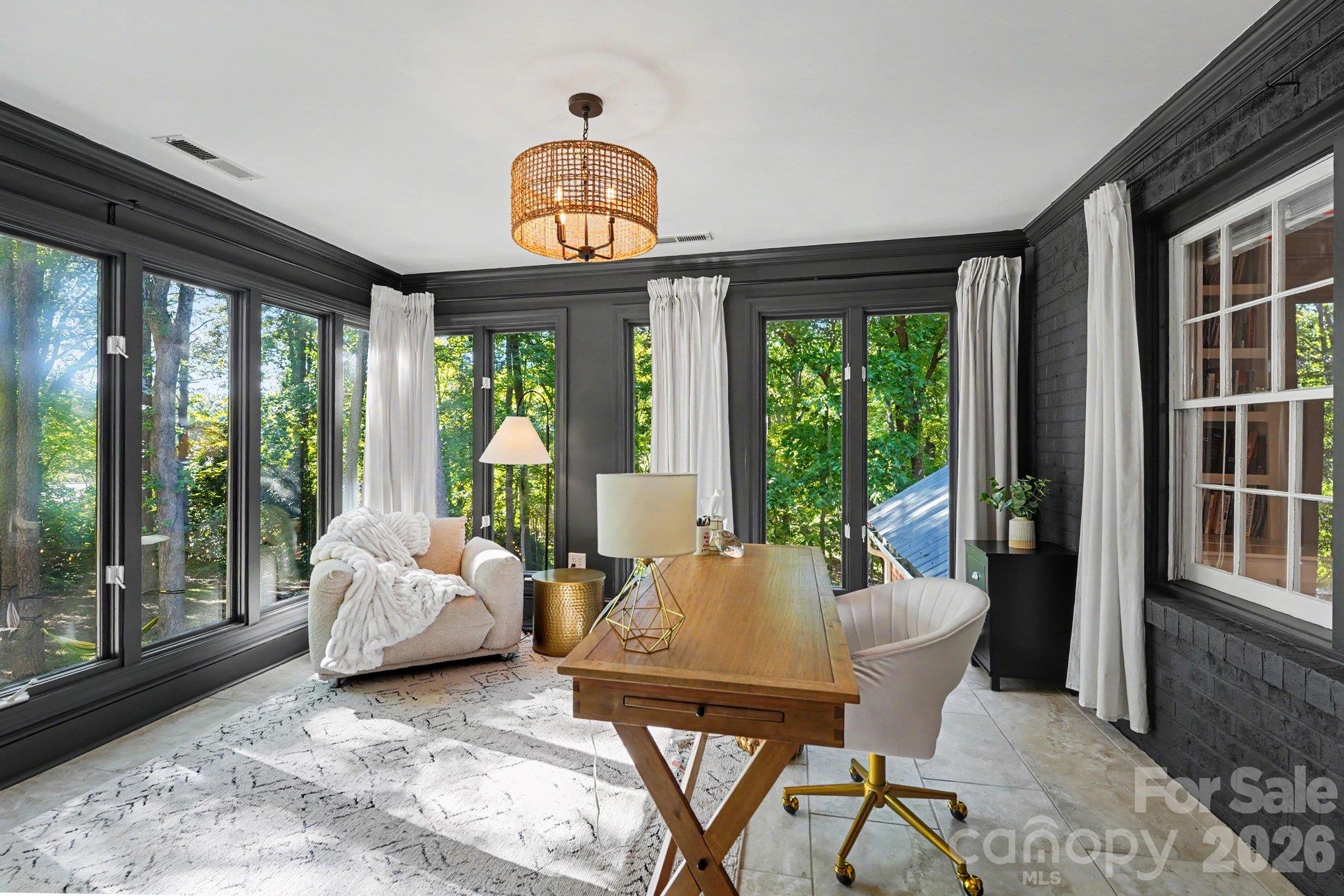 An attached office to the primary suite offers the feel of a private sunroom with stunning views - 607 Anderson Avenue, Salisbury