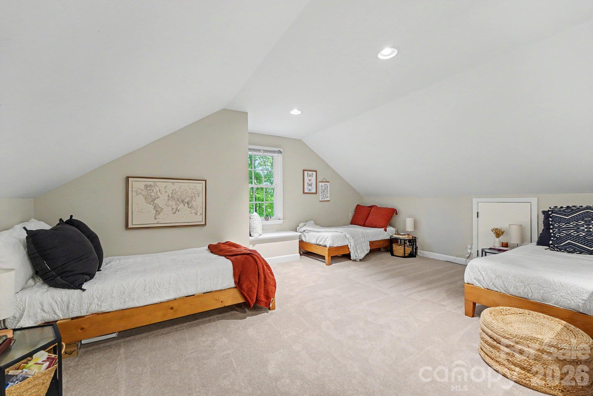 Spacious third floor retreat with an oversized walk in closet and its own mini-split system. Currently used as a bedroom, with flexibility for a guest retreat, gym, or studio - 607 Anderson Avenue, Salisbury