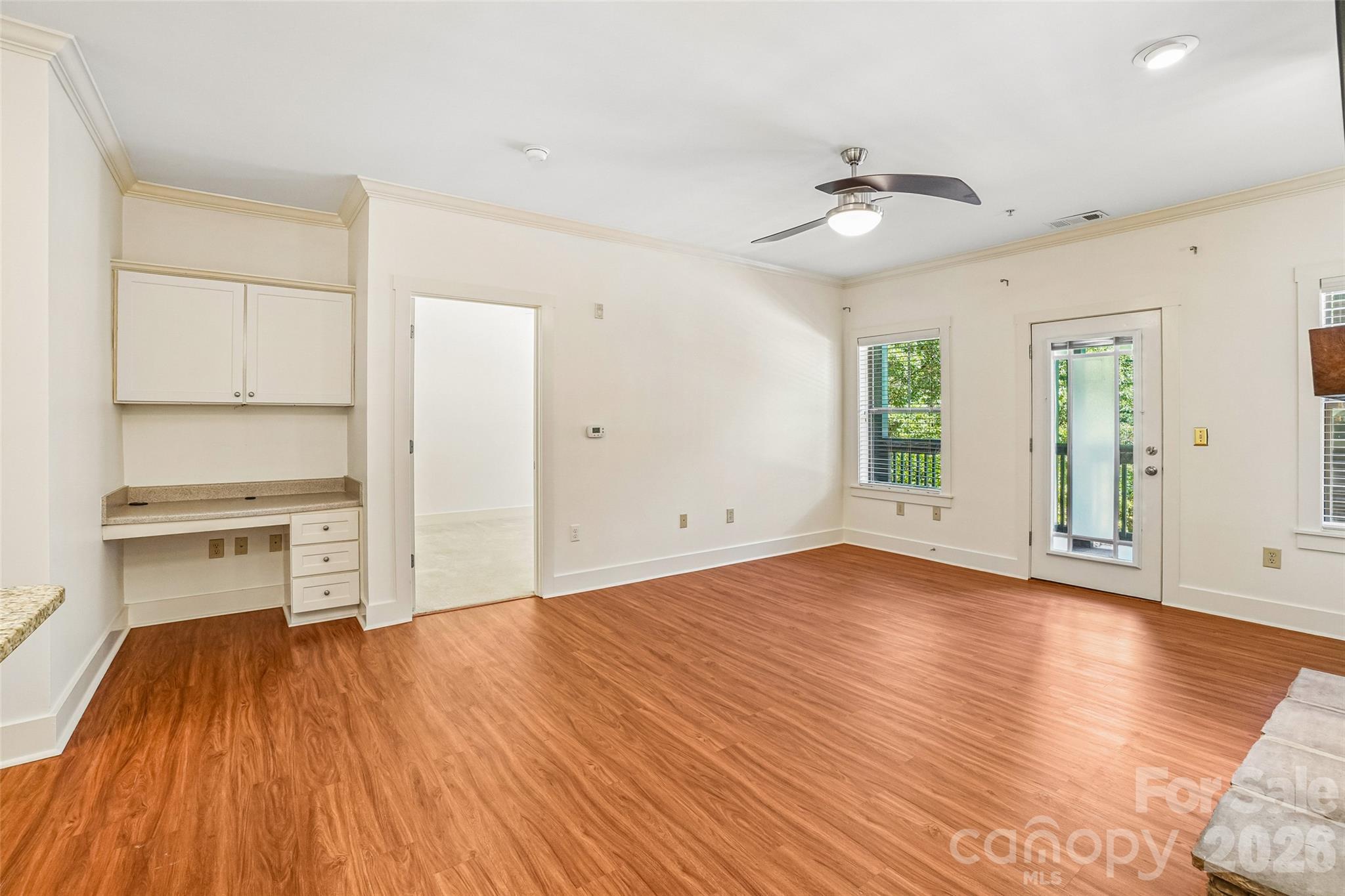 Living area with computer nook and balcony access. - 9 Kenilworth Knolls, Asheville