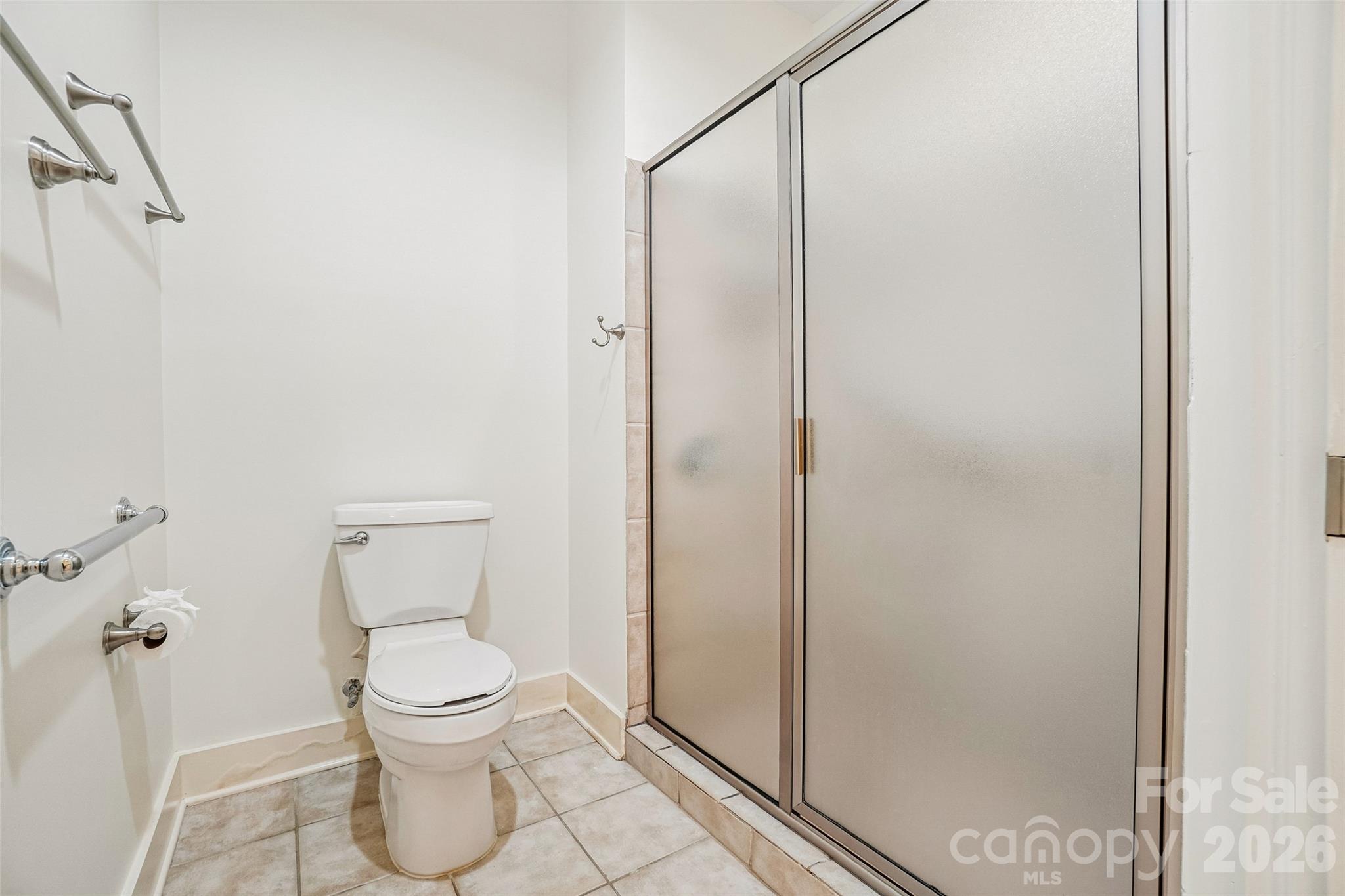 Primary bathroom also has a standard shower. - 9 Kenilworth Knolls, Asheville