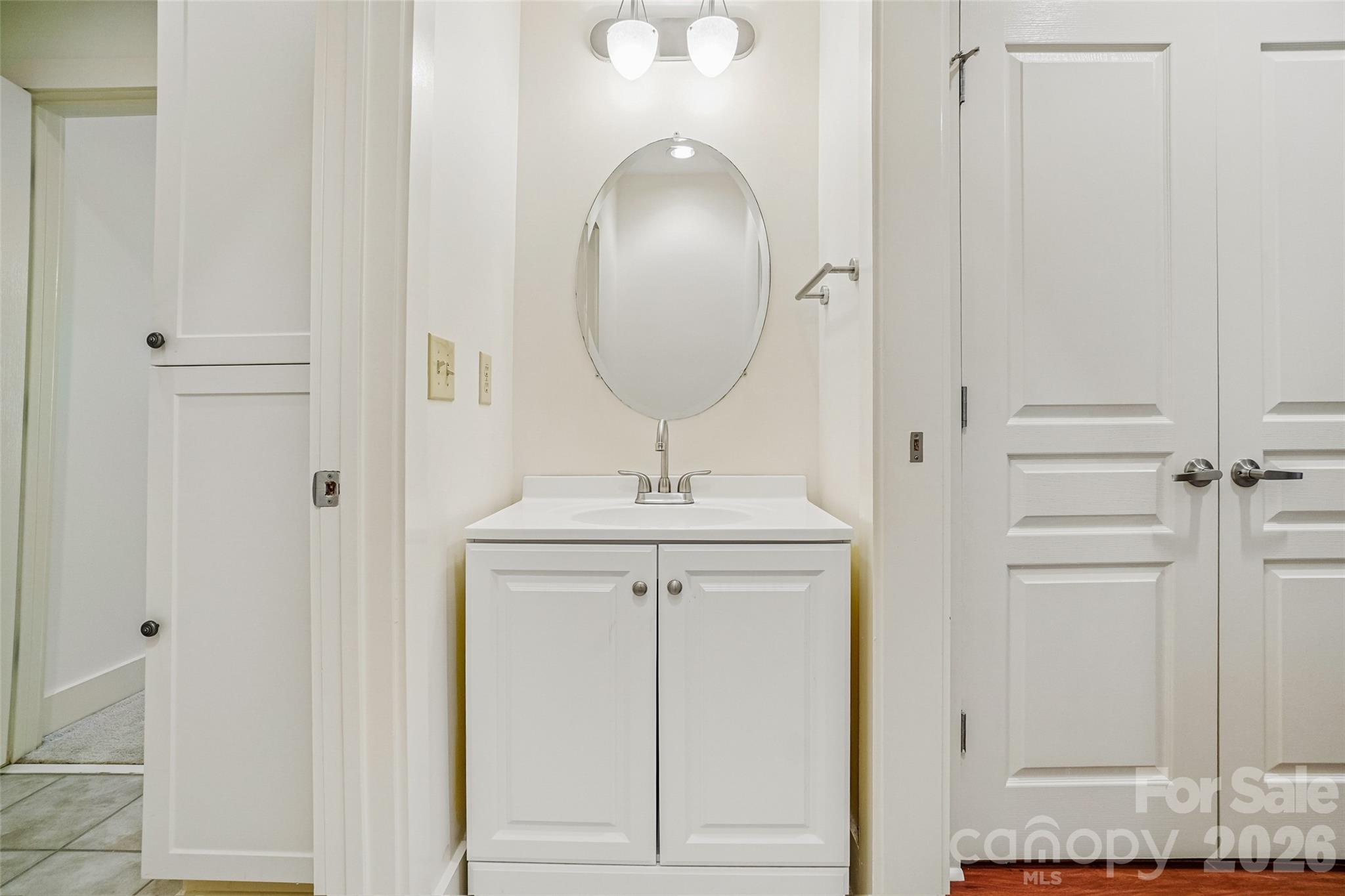 Dual entry bathroom connects to second bedroom and a hallway for guest access. - 9 Kenilworth Knolls, Asheville