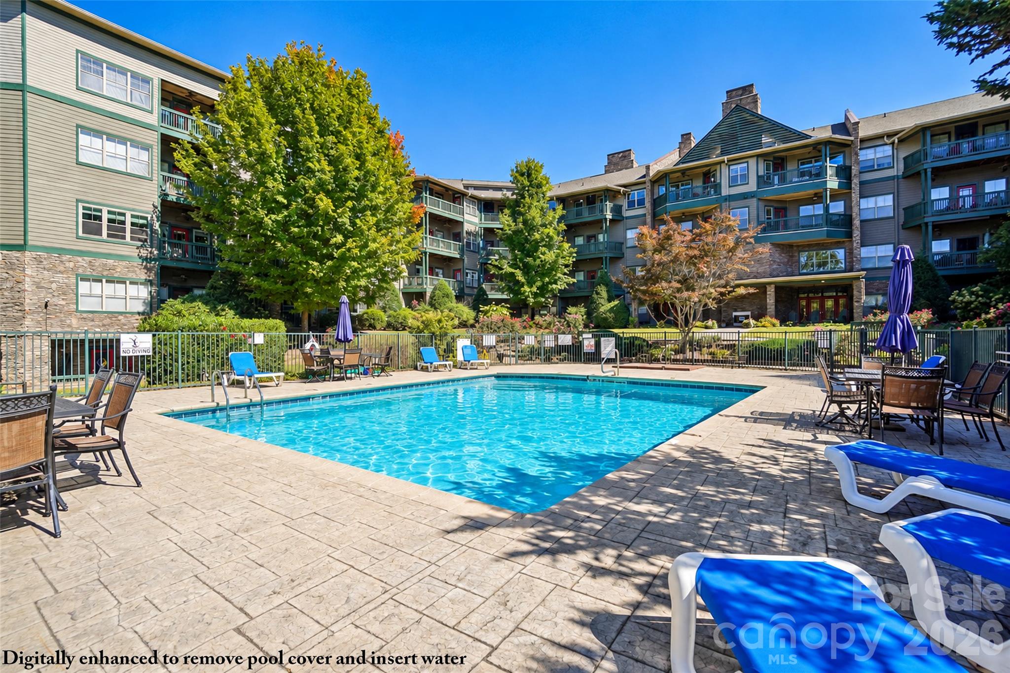 Outdoor pool is closed for the season, so the water is digitally inserted to give you an idea of what's to come in spring. - 9 Kenilworth Knolls, Asheville