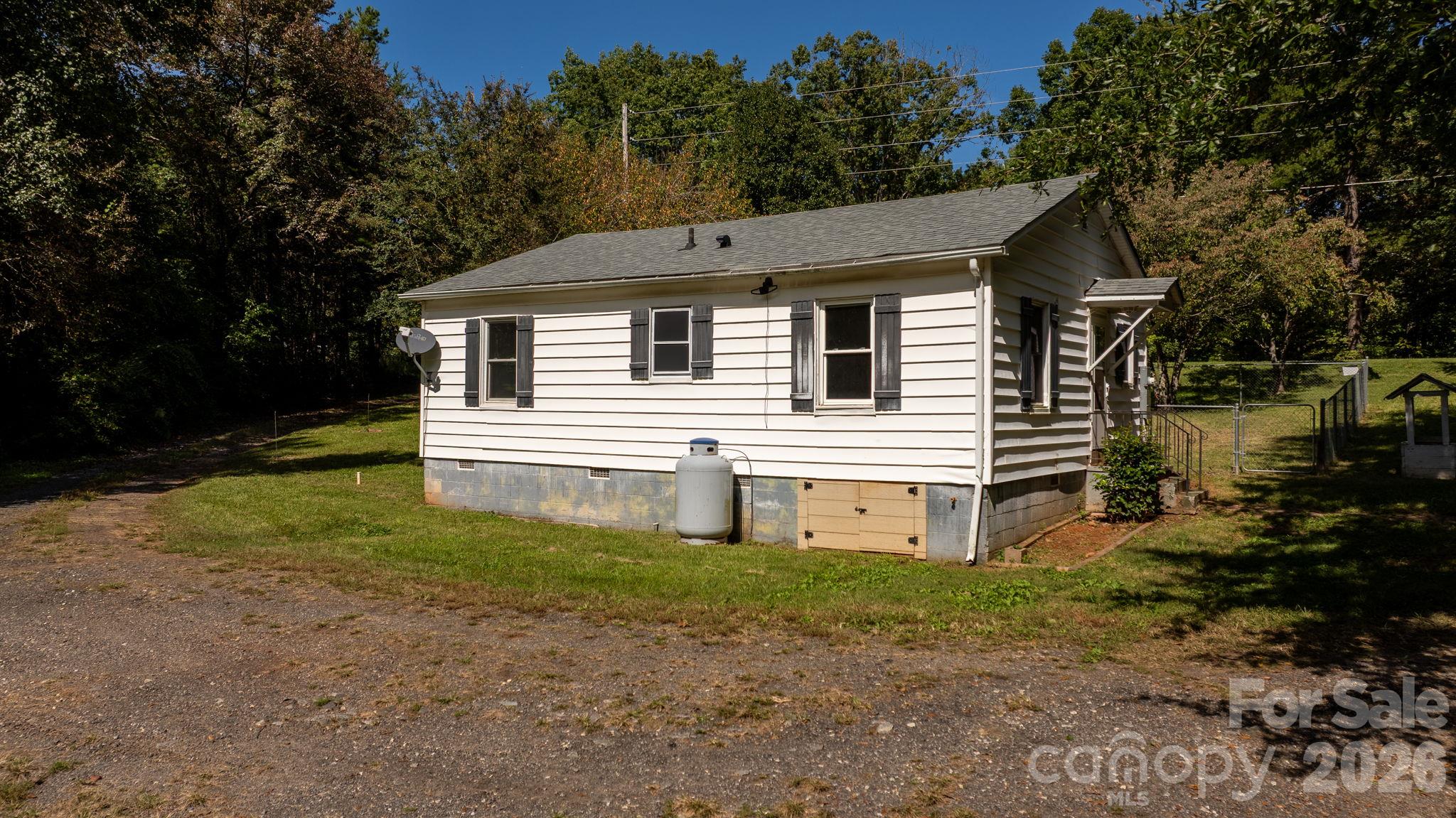 Tank against house has not been used since seller purchased the home - 6048 Sugar Loaf Road, Connelly Springs