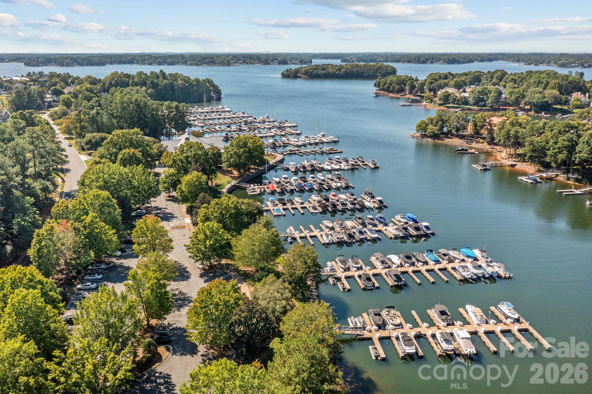 Take advantage of the community marina, perfect for boating and waterfront recreation on the lake. - 18416 Peninsula Club Drive, Cornelius