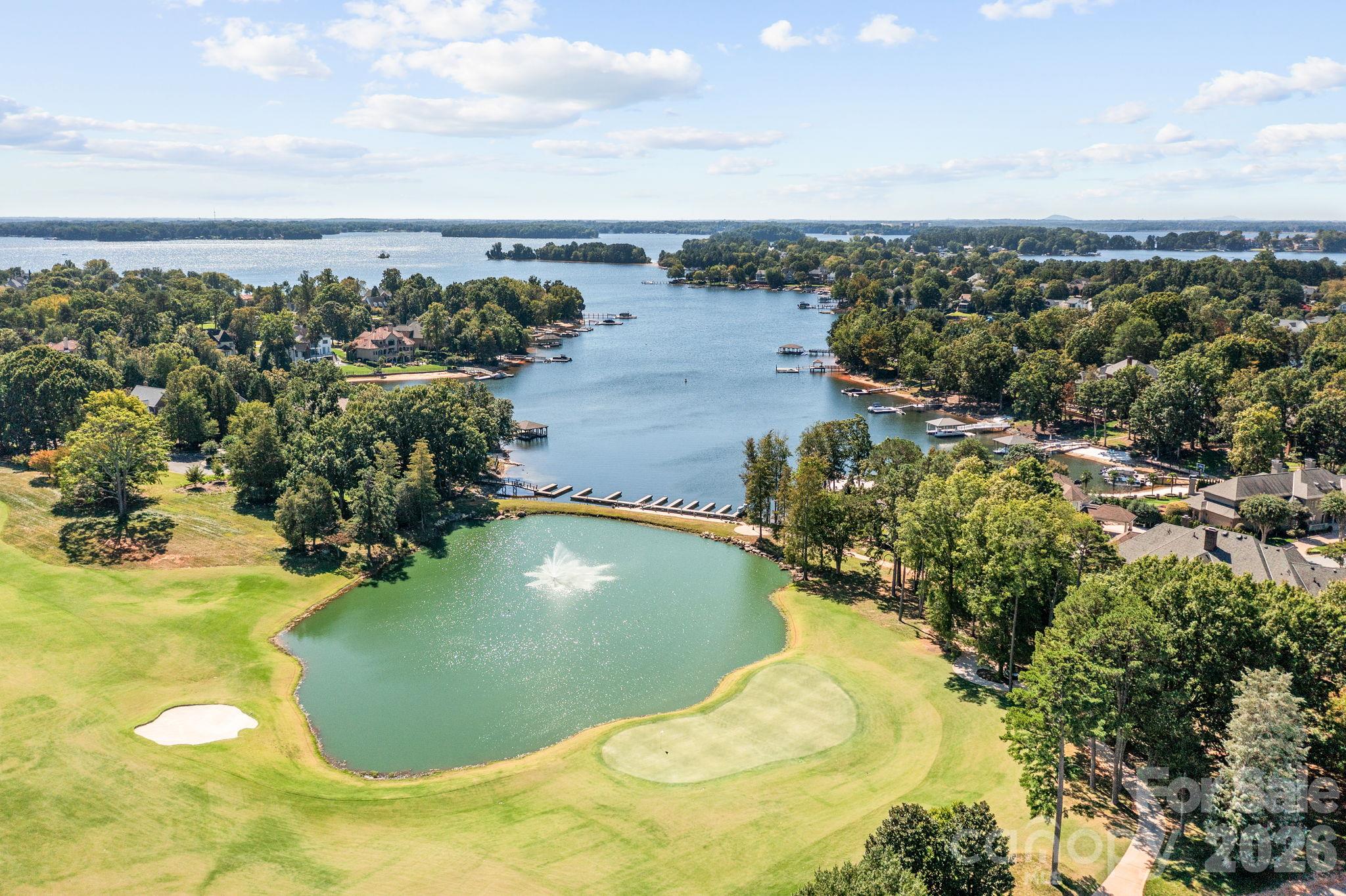 Scenic views overlooking the lush fairways of the neighborhood golf course. - 18416 Peninsula Club Drive, Cornelius