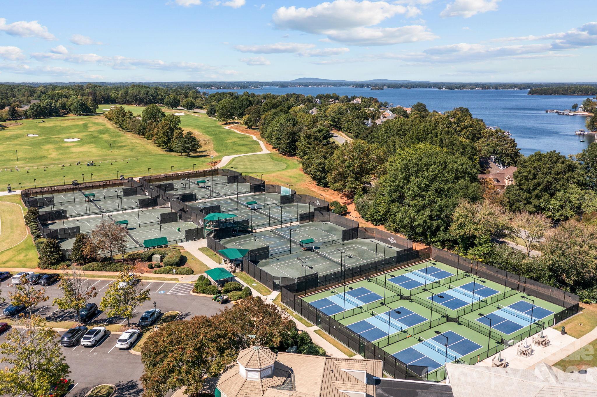 Overhead look at the neighborhood pickleball and tennis courts, ready for match play. - 18416 Peninsula Club Drive, Cornelius