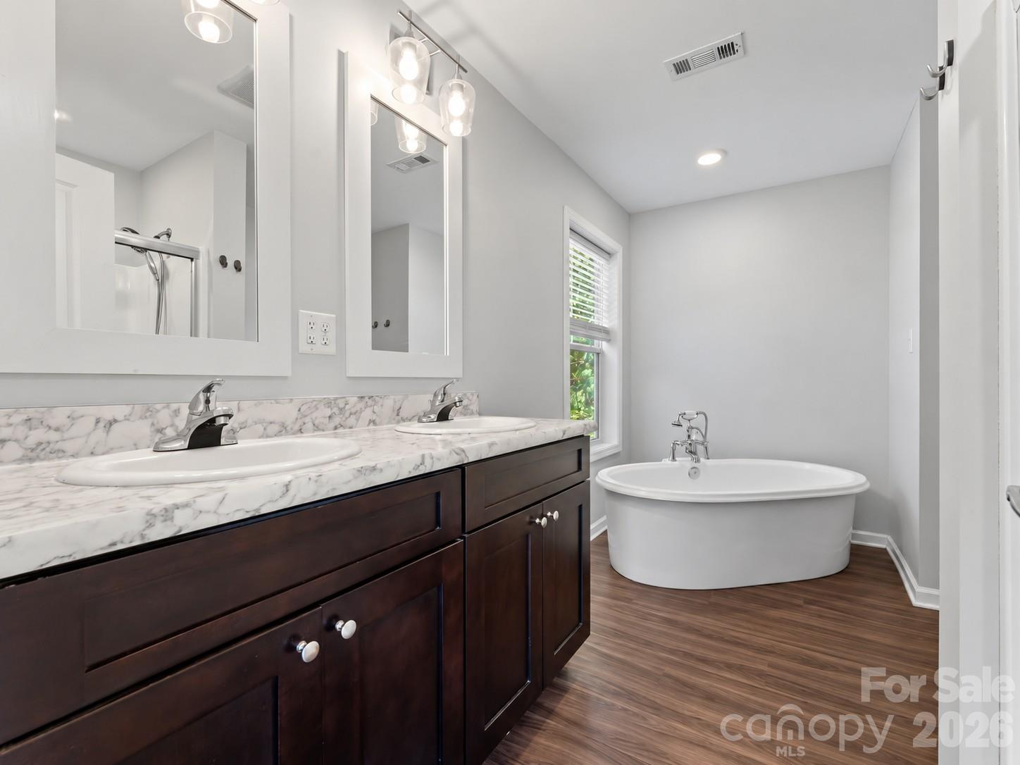 Primary Bathroom with Deep Soaking tub, double sinks, and oversized walk-in shower - 36 Tempie Lane, Arden