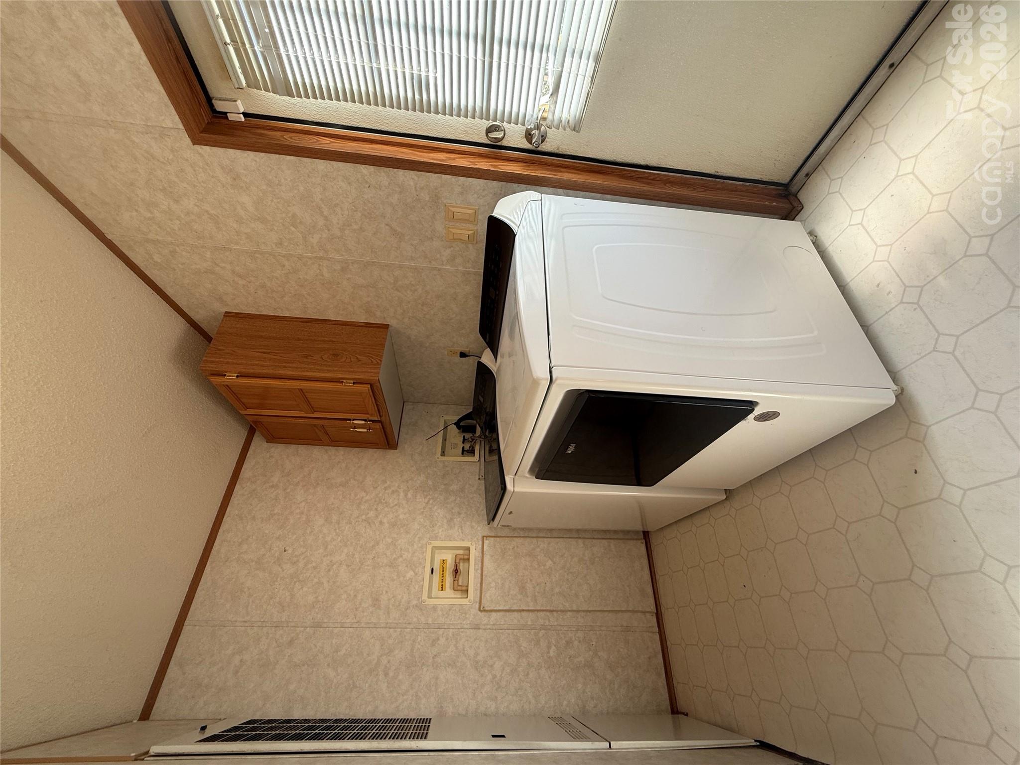 Laundry area and side entrance - 97 Fair Haven Drive, Burnsville