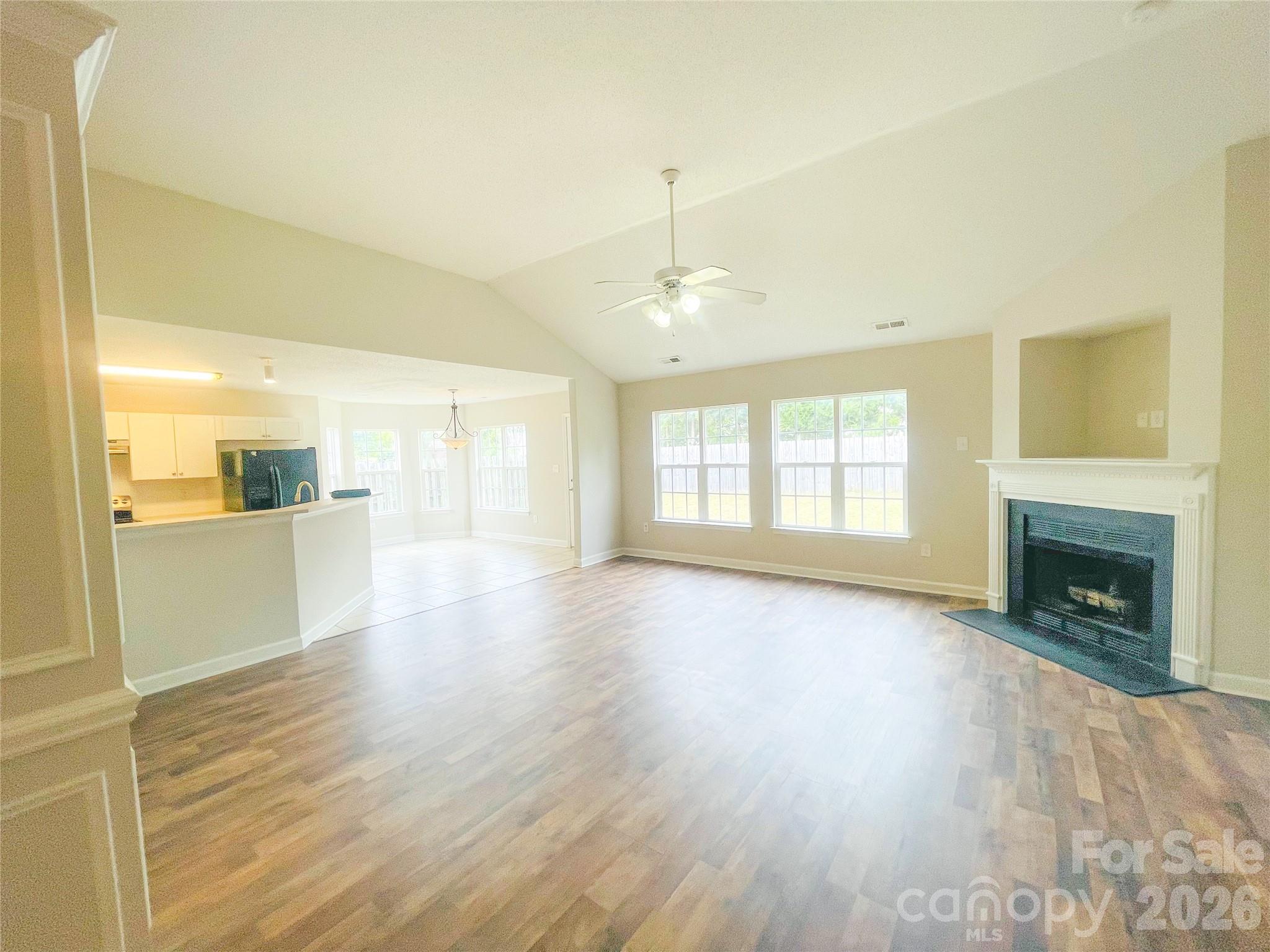 Family room looking toward kitchen / breakfast nook - 1011 Cadberry Court, Indian Trail