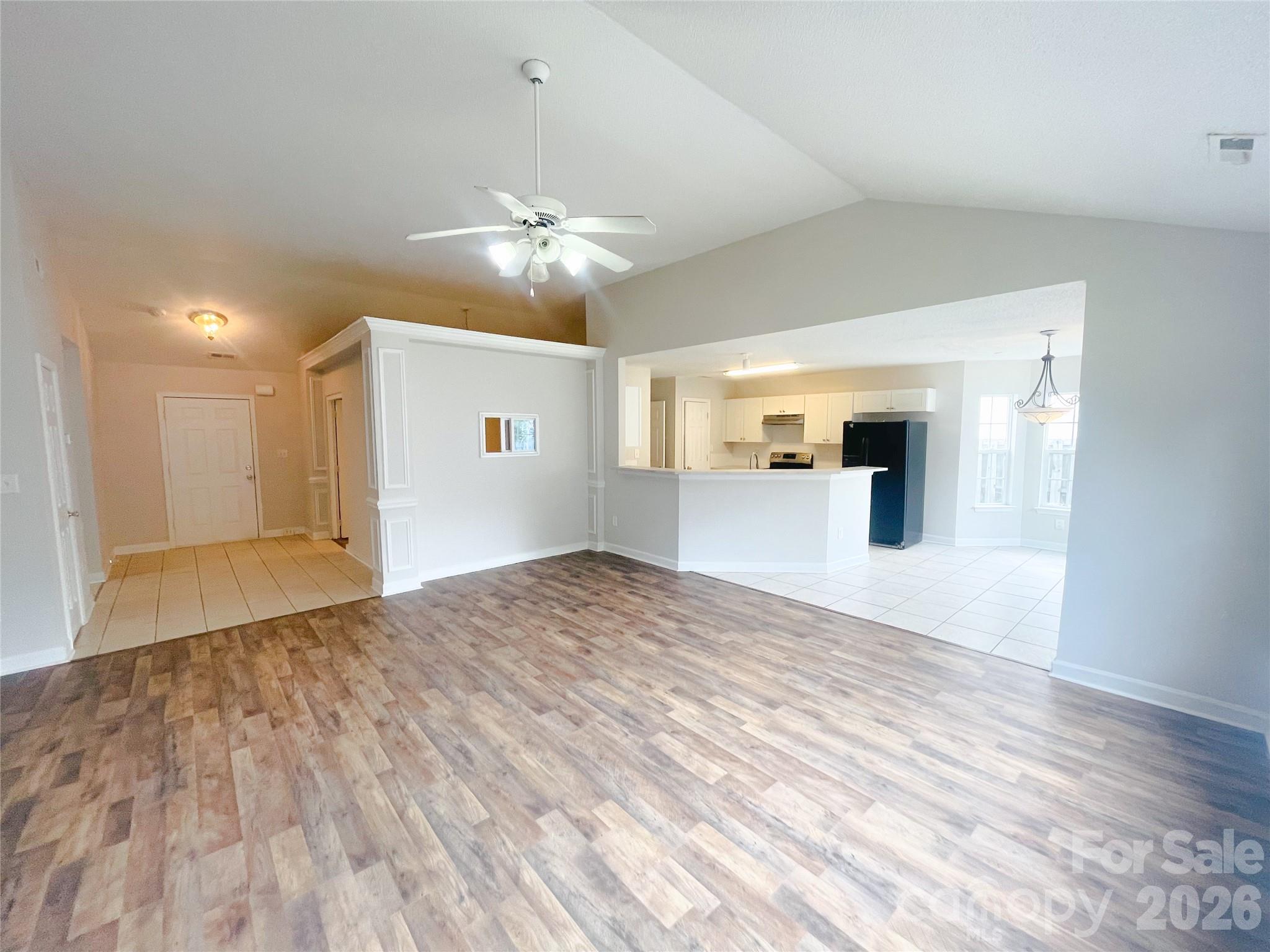 Family room lookin from fireplace towards kitchen / office - 1011 Cadberry Court, Indian Trail