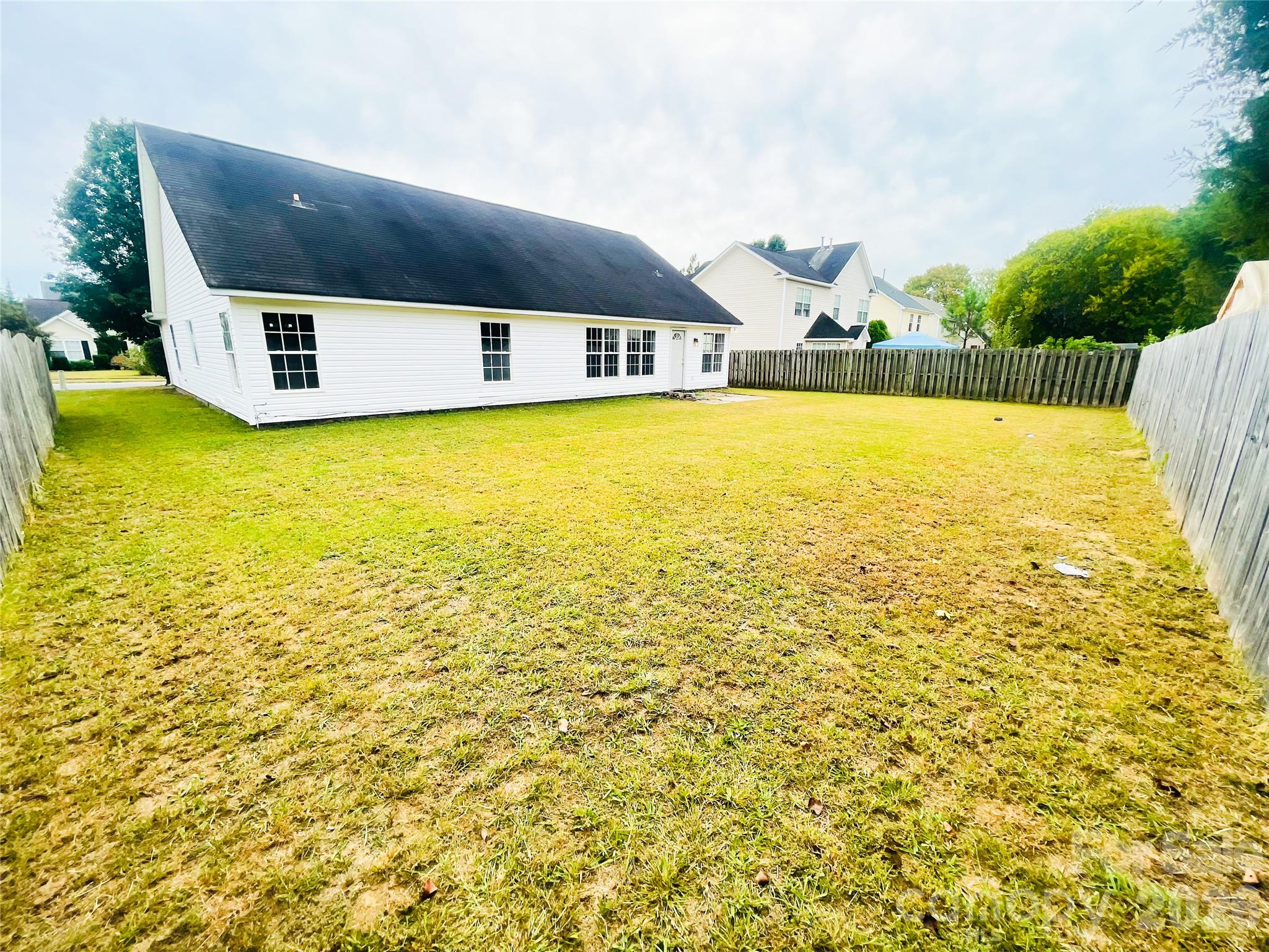 Spacious backyard from rear right - 1011 Cadberry Court, Indian Trail