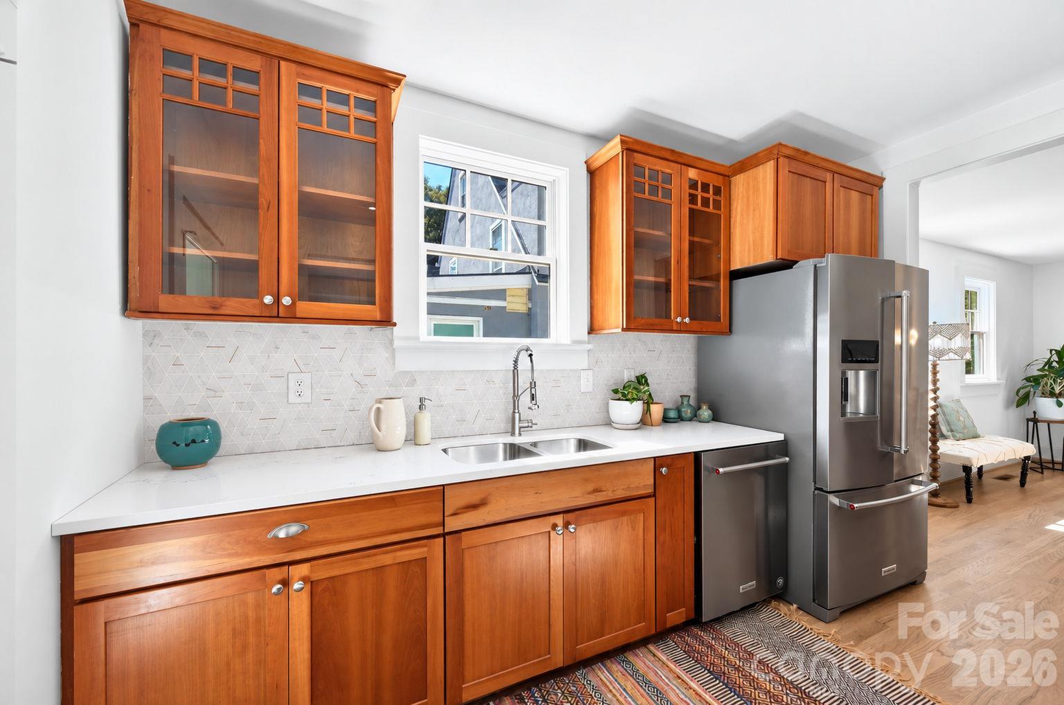 Beautiful Tile Backsplash and Cabinets with Crown Molding - 133 Furman Avenue, Asheville