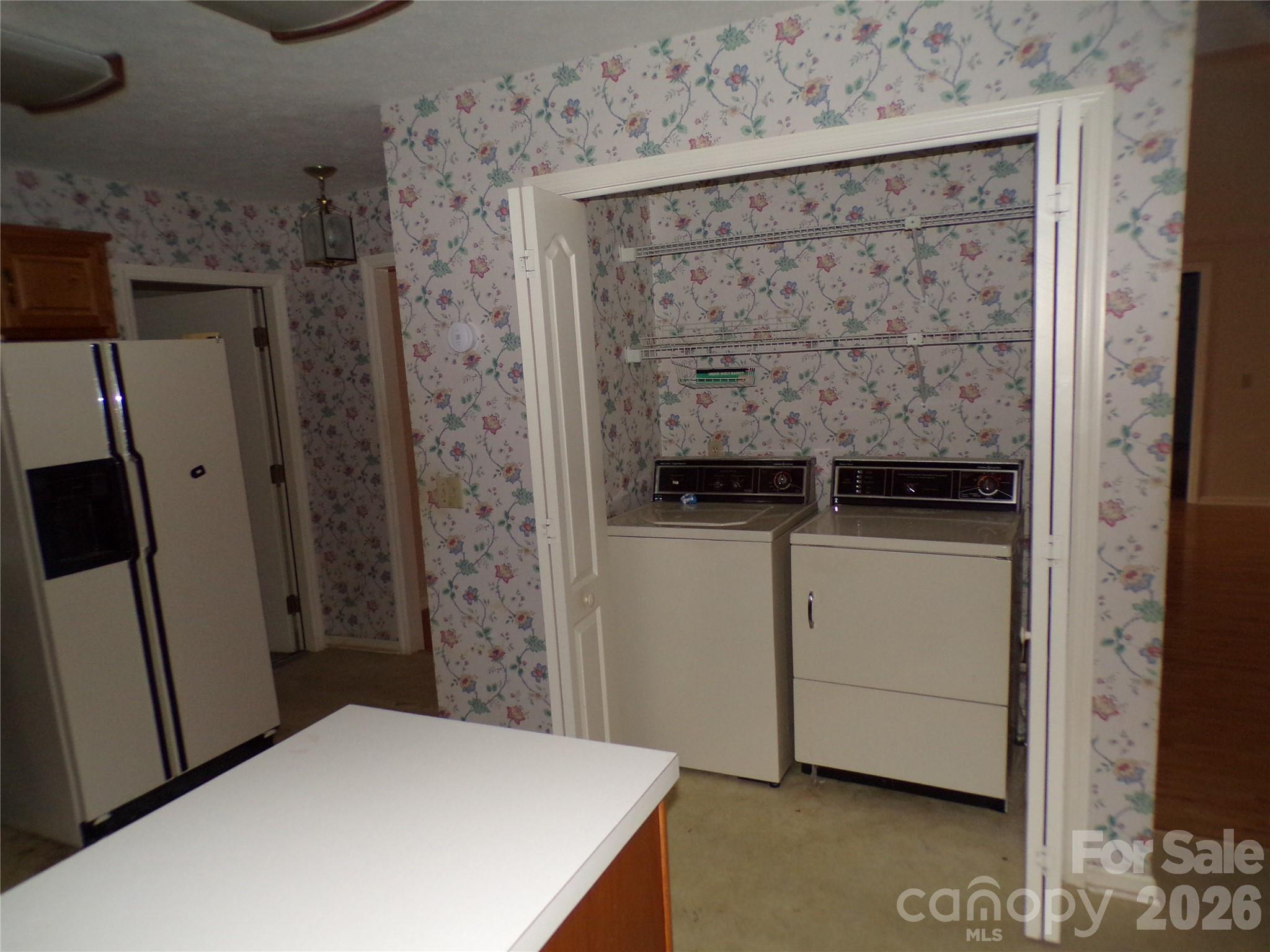 Kitchen laundry closet. - 10 Governors Drive, Hendersonville