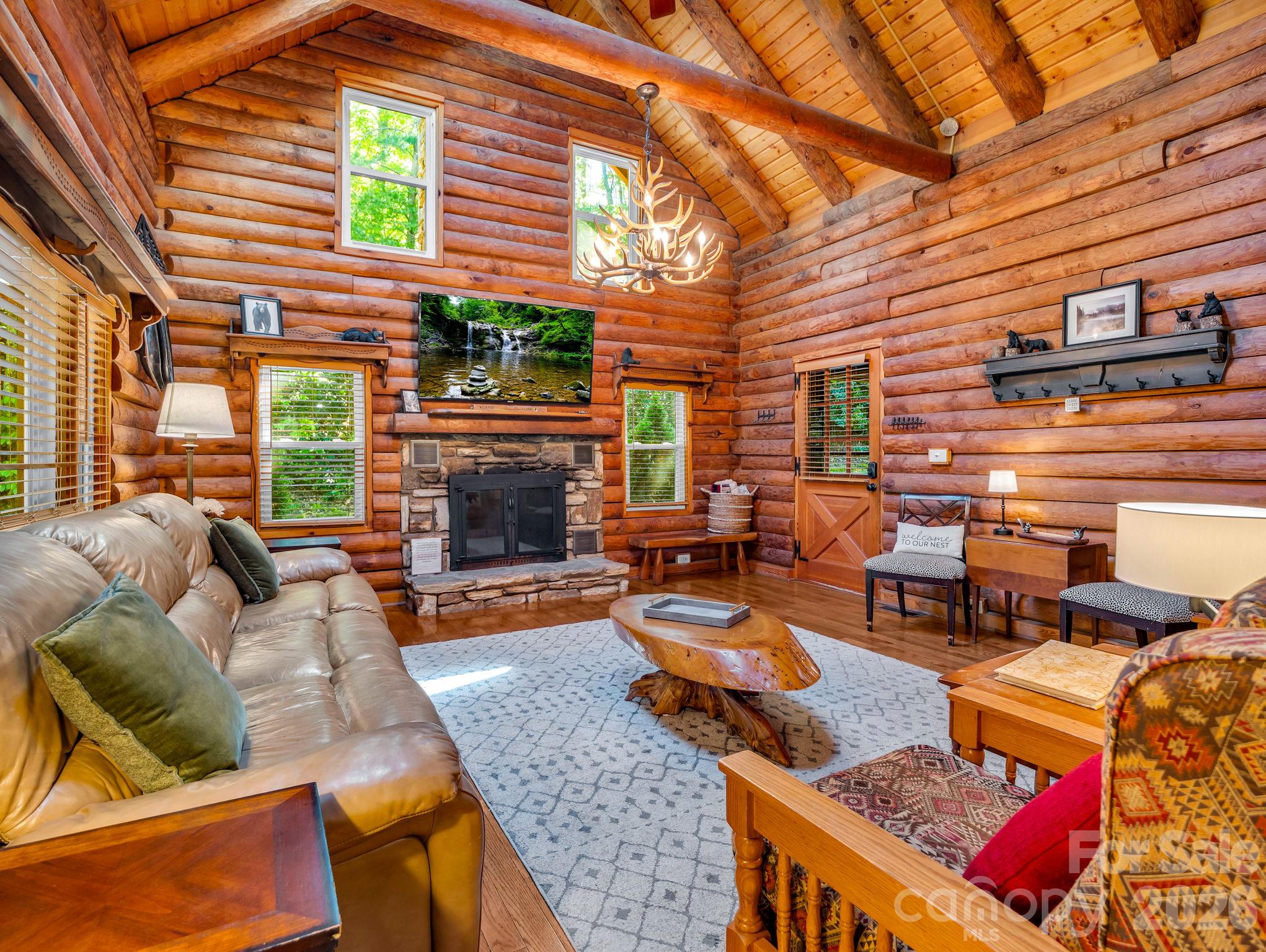 Living room wood burning fireplace - 127 Cattail Road, Lake Lure
