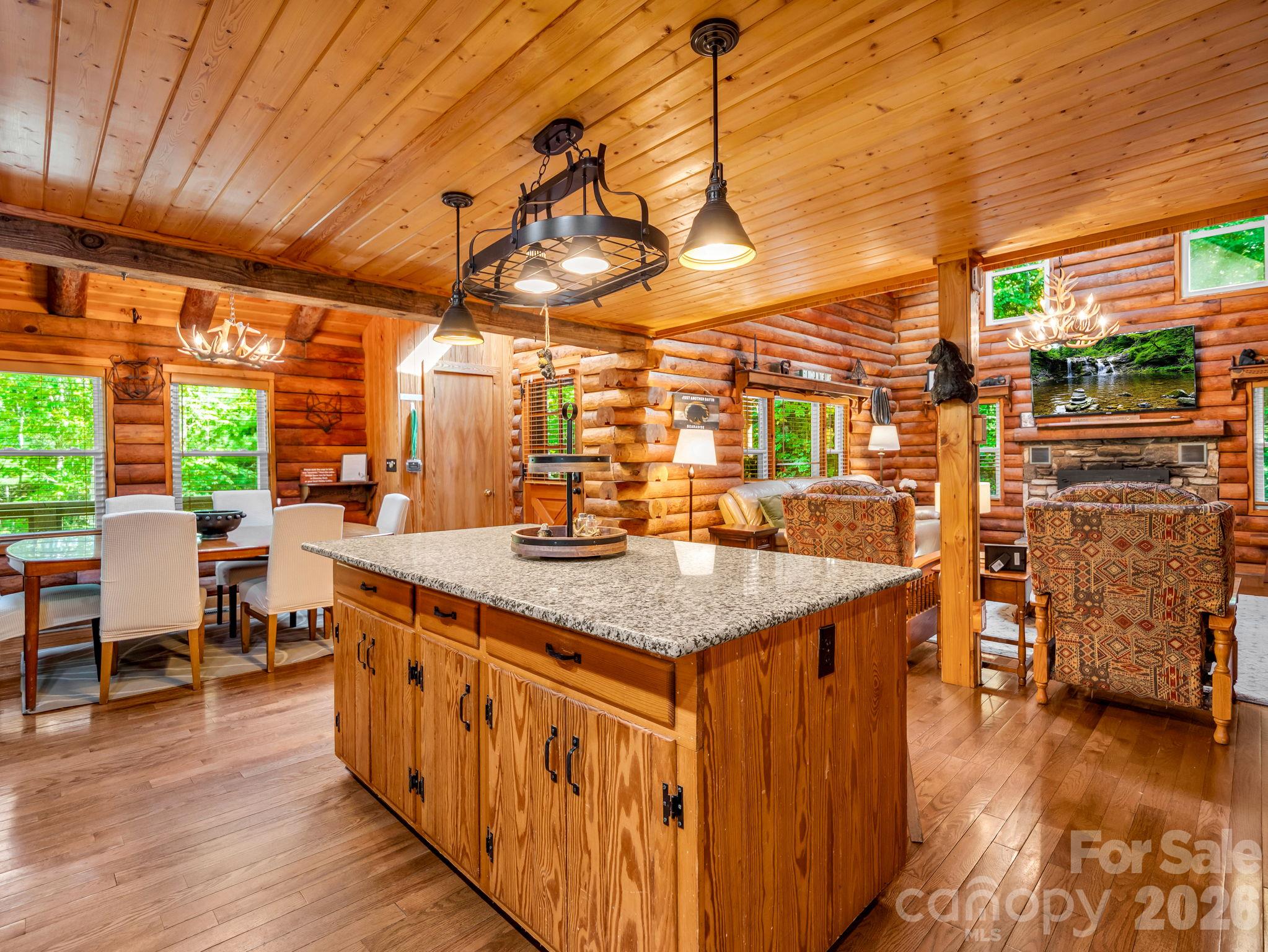 View to living room and dining from kitchen - 127 Cattail Road, Lake Lure