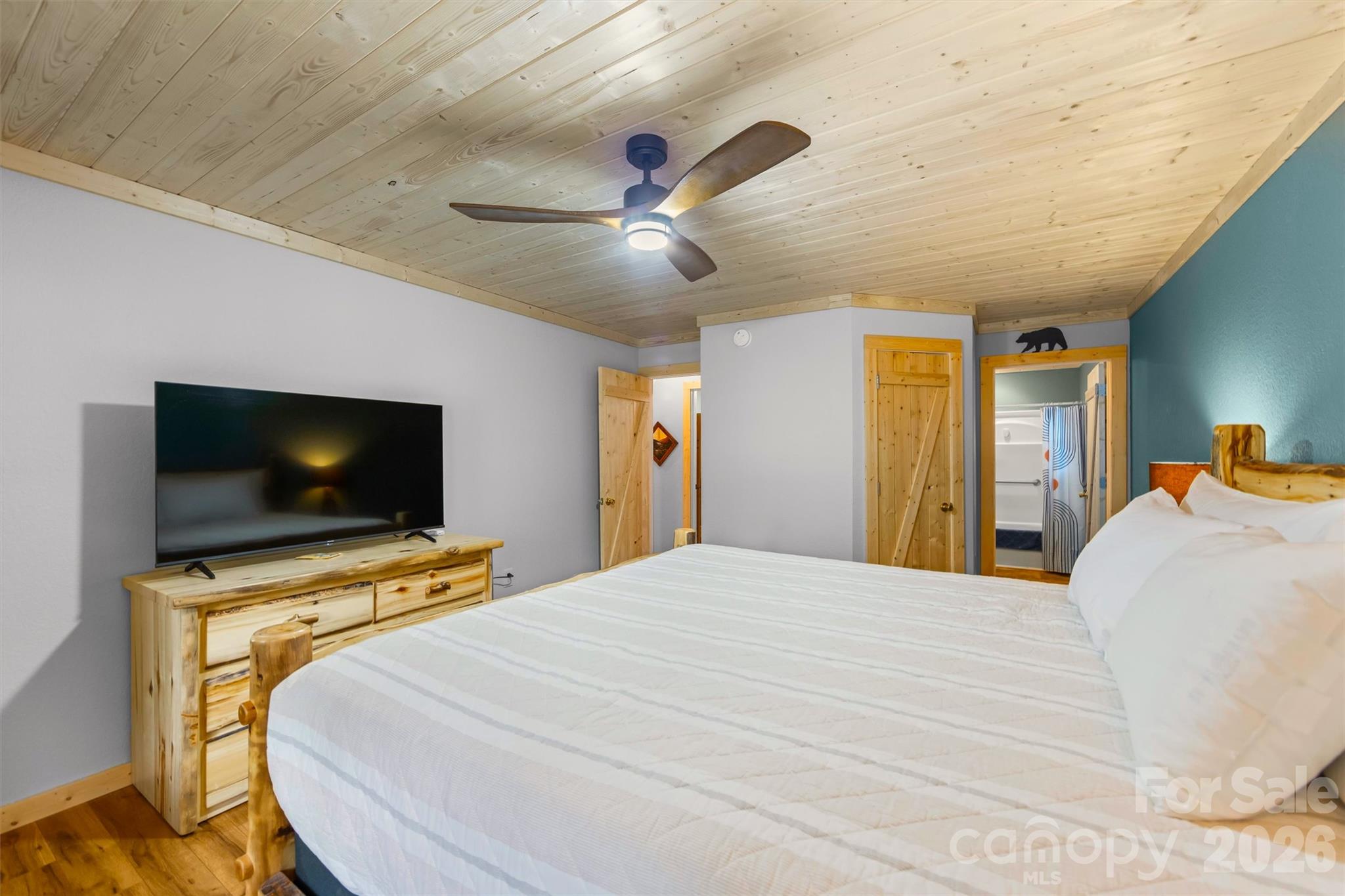 Primary Suite with door to the bath room - 588 Panoramic Loop, Maggie Valley