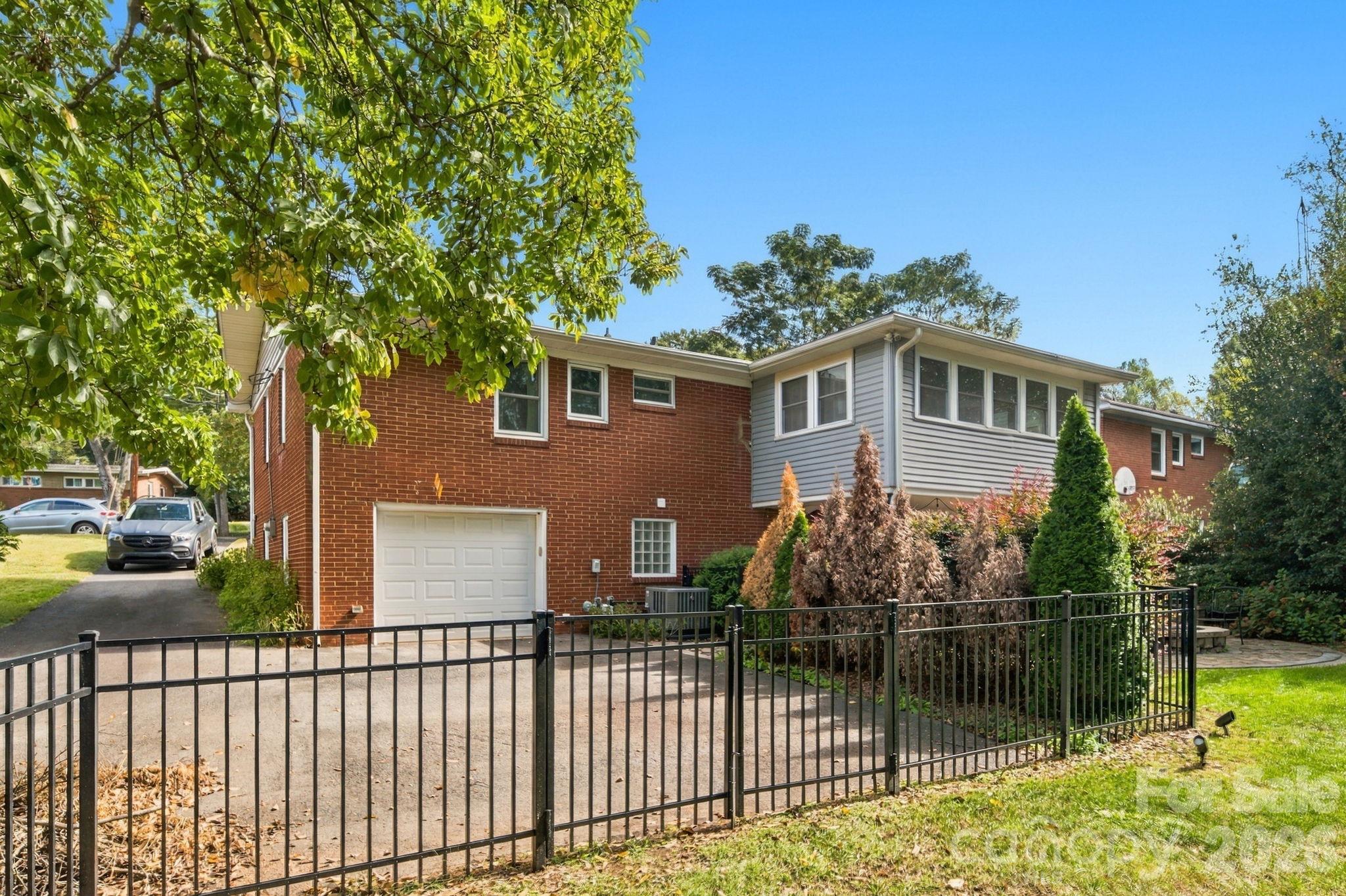 Attached garage with ample parking - 6520 Candlewood Drive, Charlotte