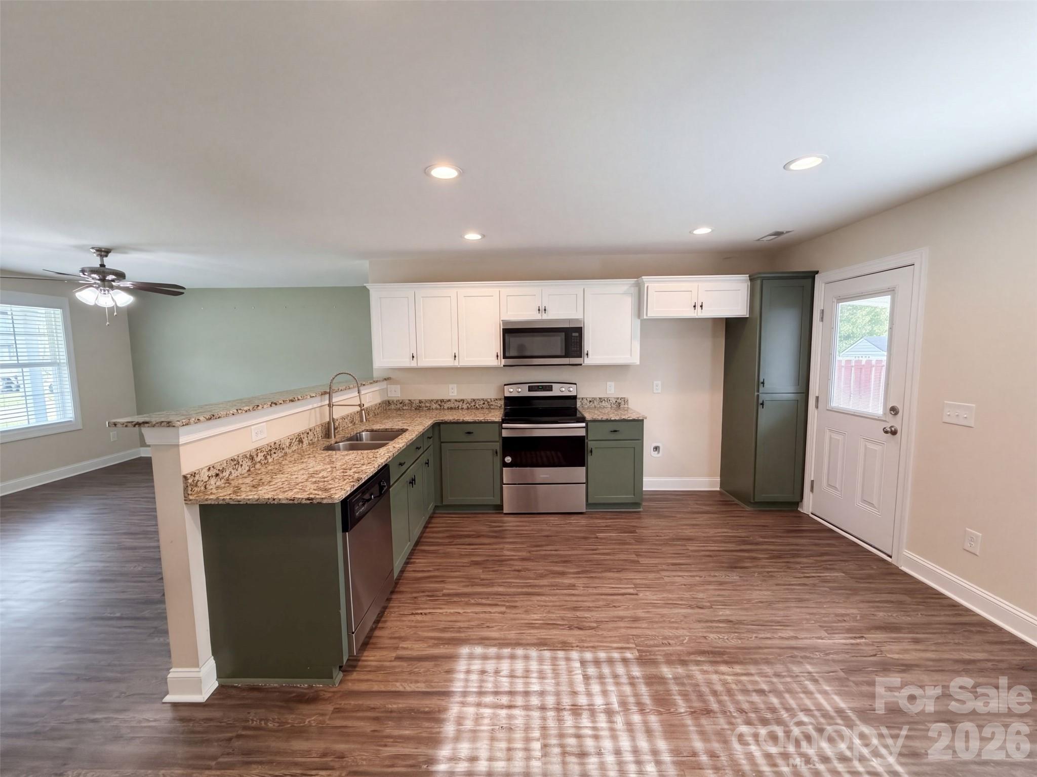 Single Family Residence at 335 Odell Drive NW, Concord, photo 2 of 21