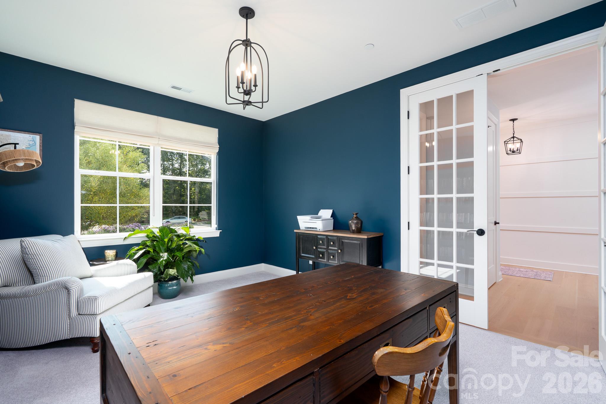 Main floor Office/Study view of front yard and green space. - 9588 Pacing Lane NW, Concord