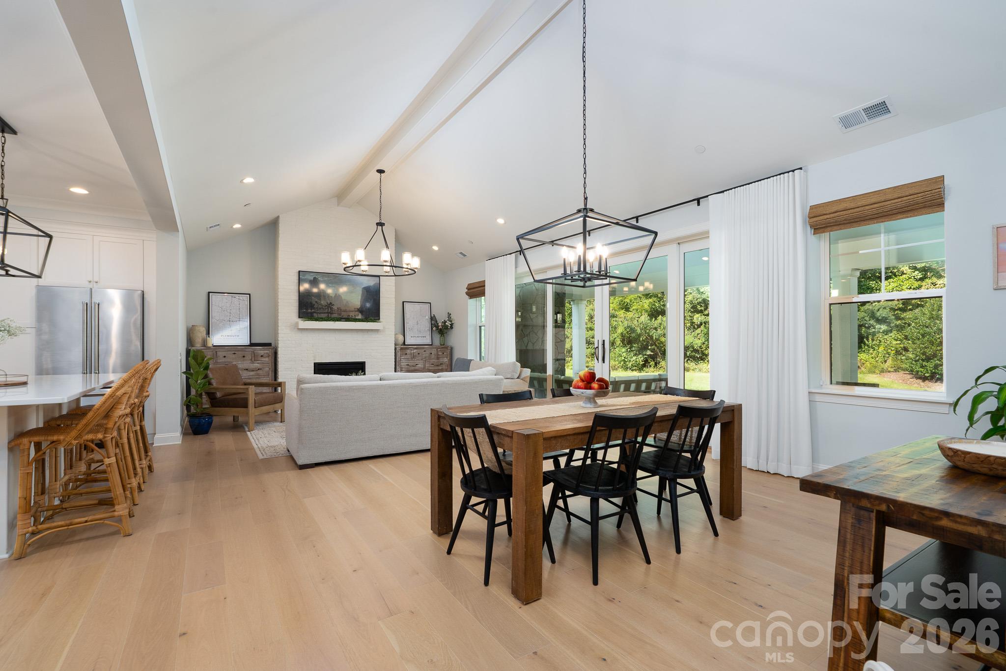 Vaulted ceilings in Dining Room finished off with custom Lighting - 9588 Pacing Lane NW, Concord