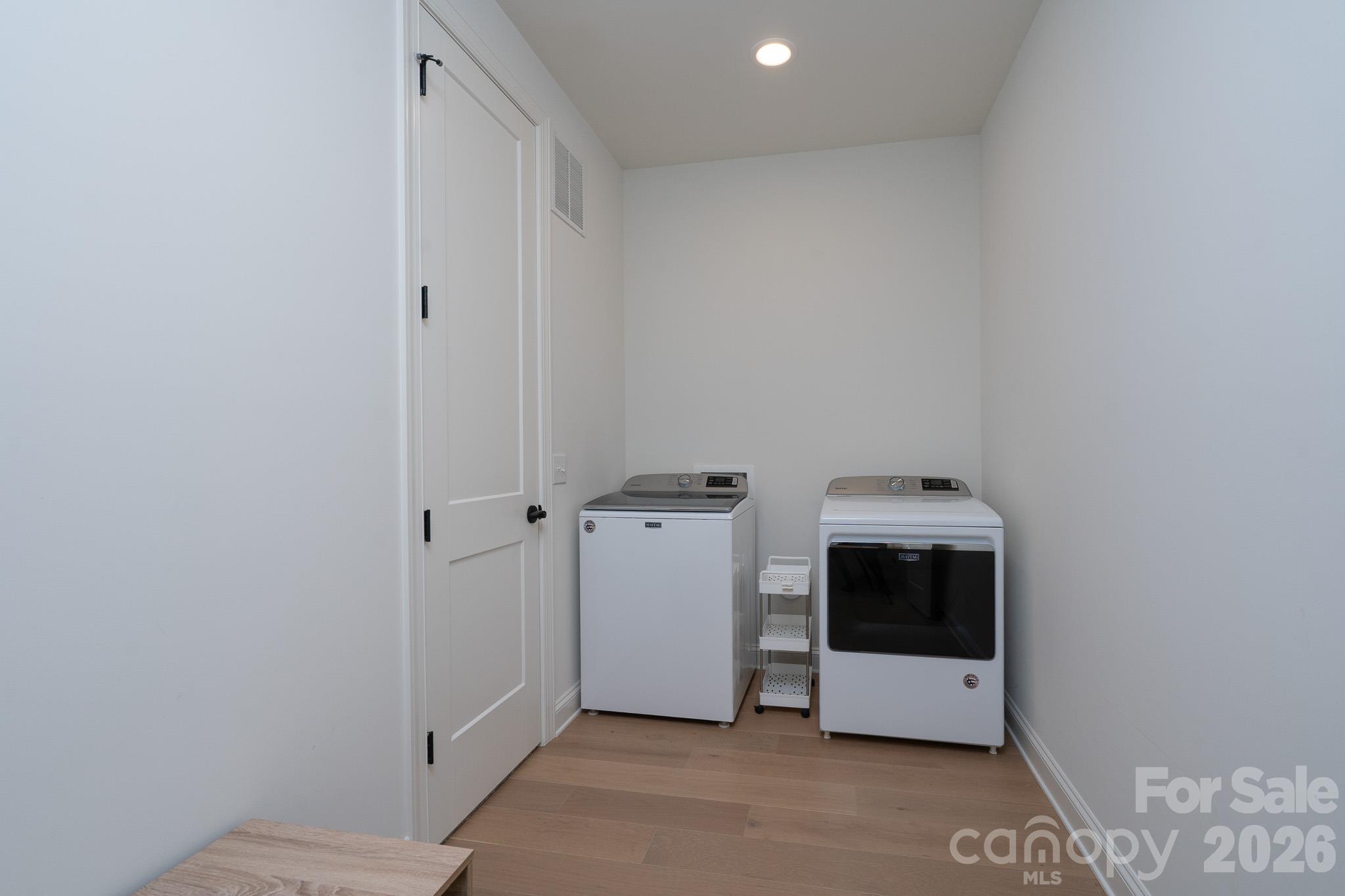Main floor Laundry - Comes with Washer and Dryer - 9588 Pacing Lane NW, Concord