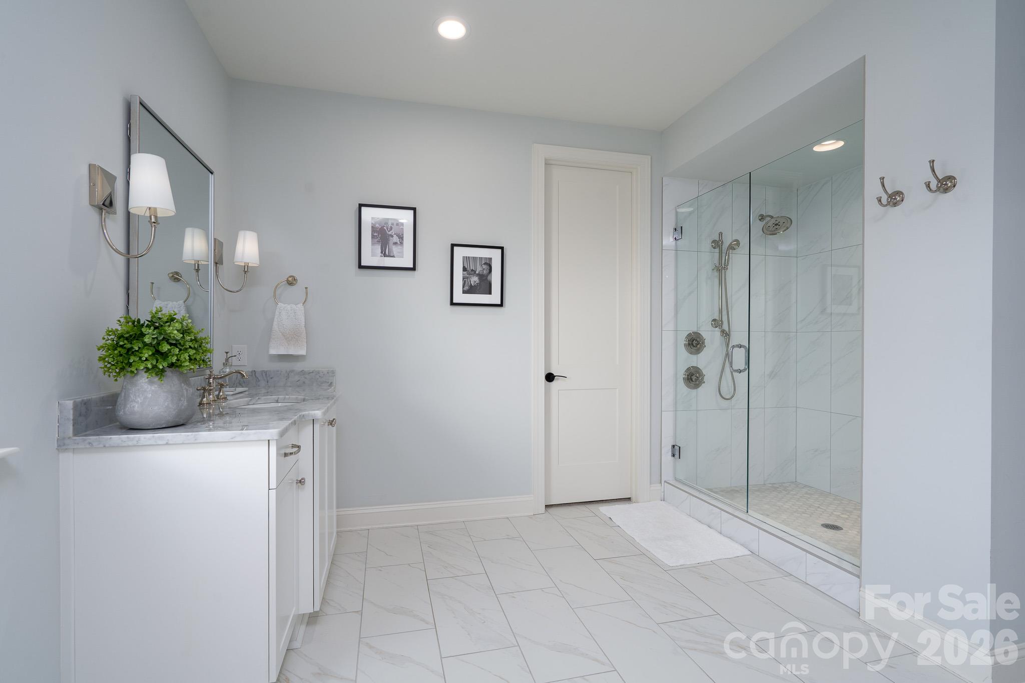 This wide-open Primary Bath allows each to have the space needed. - 9588 Pacing Lane NW, Concord
