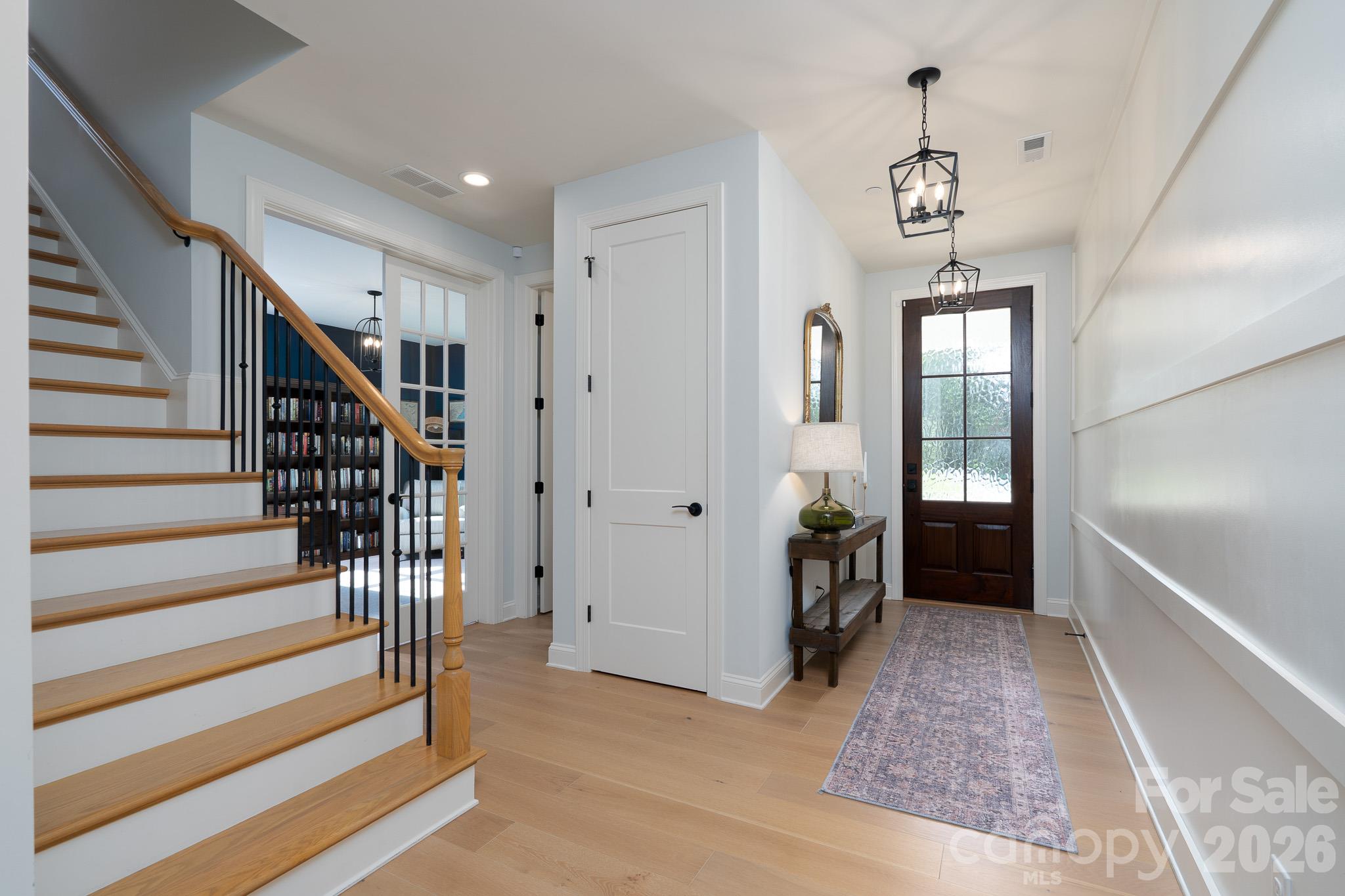 Blonde Hardwoods throughout and including the Staircase - 9588 Pacing Lane NW, Concord