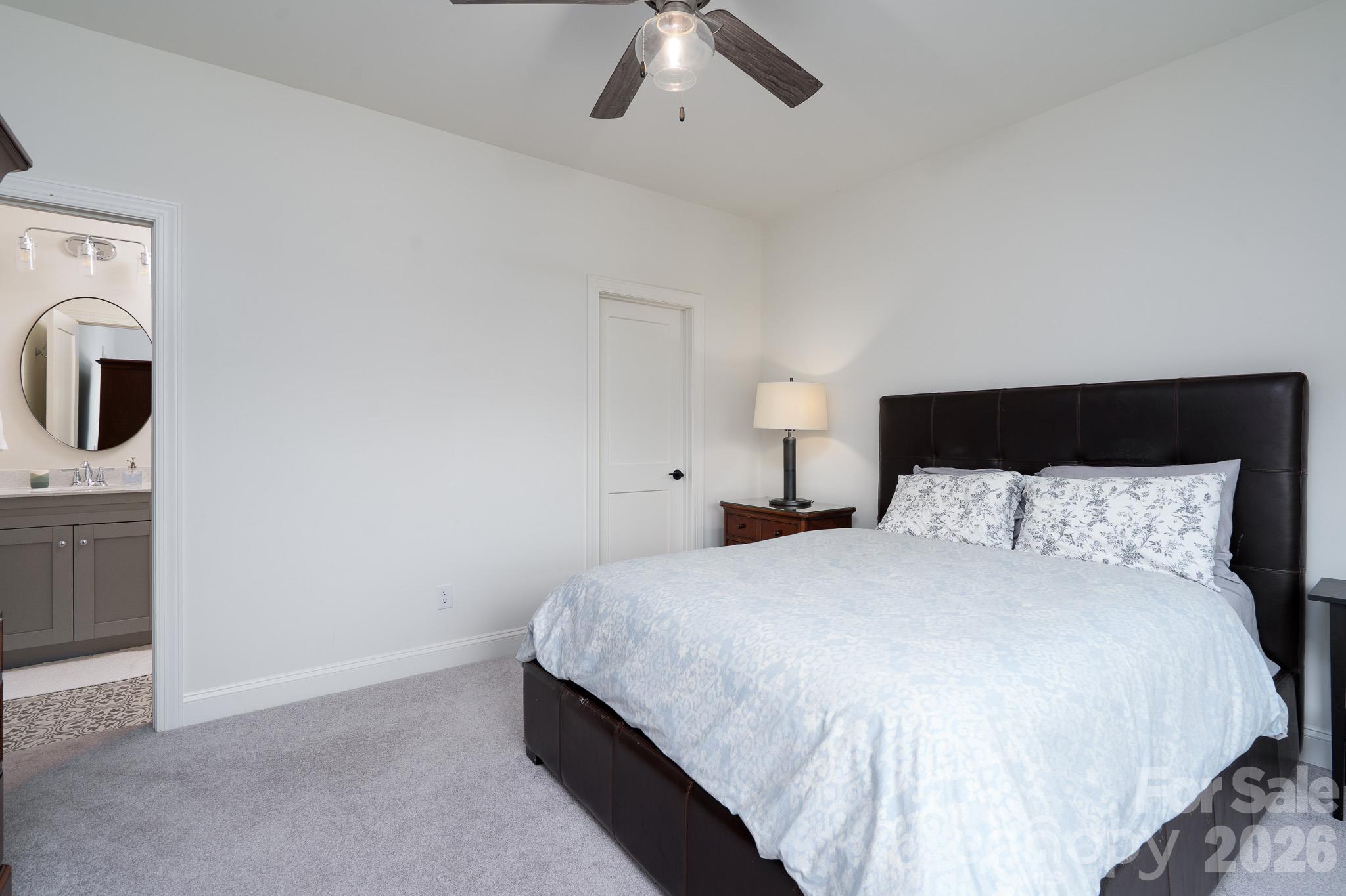 3rd Bedroom on the second floor offers large walk-in Closet and completely private Bathroom with Tile Shower with glass door - 9588 Pacing Lane NW, Concord