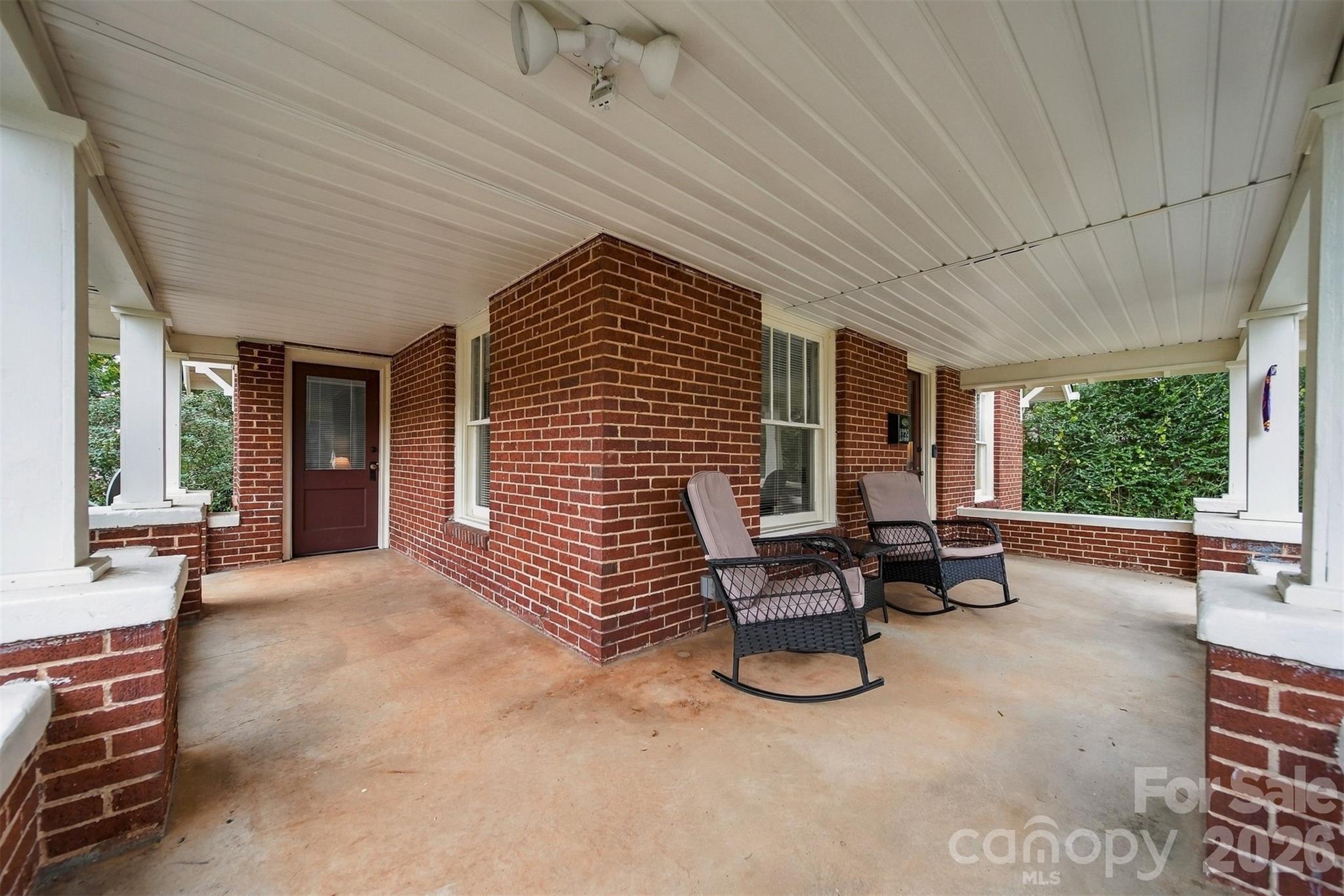 A welcoming front porch offers plenty of room to relax or entertain - 1339 5th Street NE, Hickory