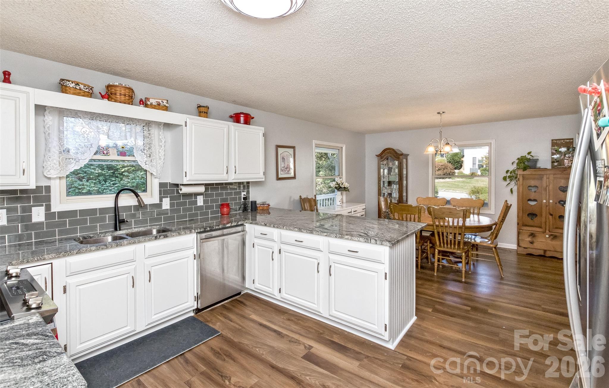 Kitchen looking into dining Area - 2911 Middleton Place, Hendersonville