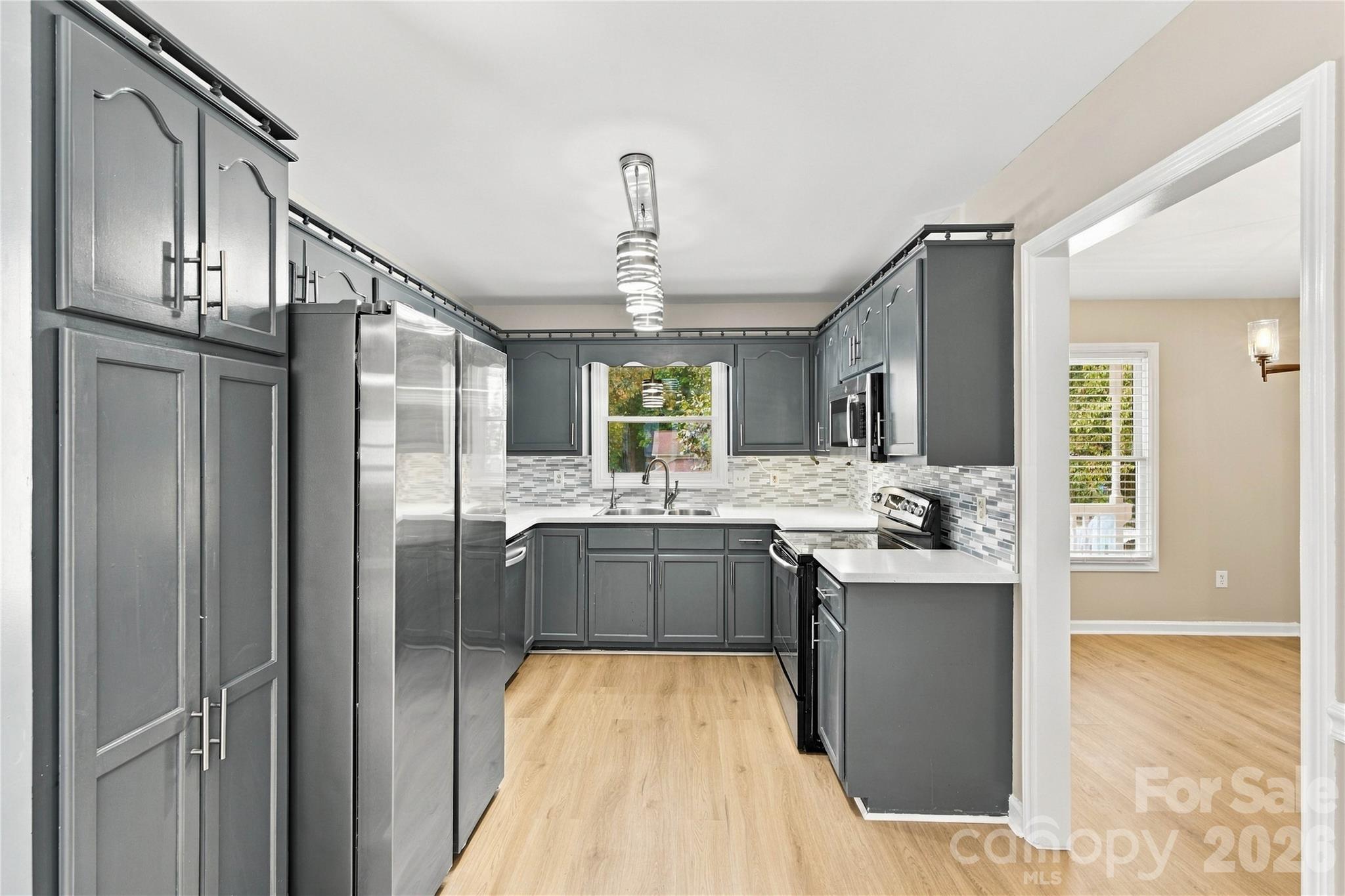 Single Family Residence at 7861 Sarah Drive, Denver, photo 11 of 36