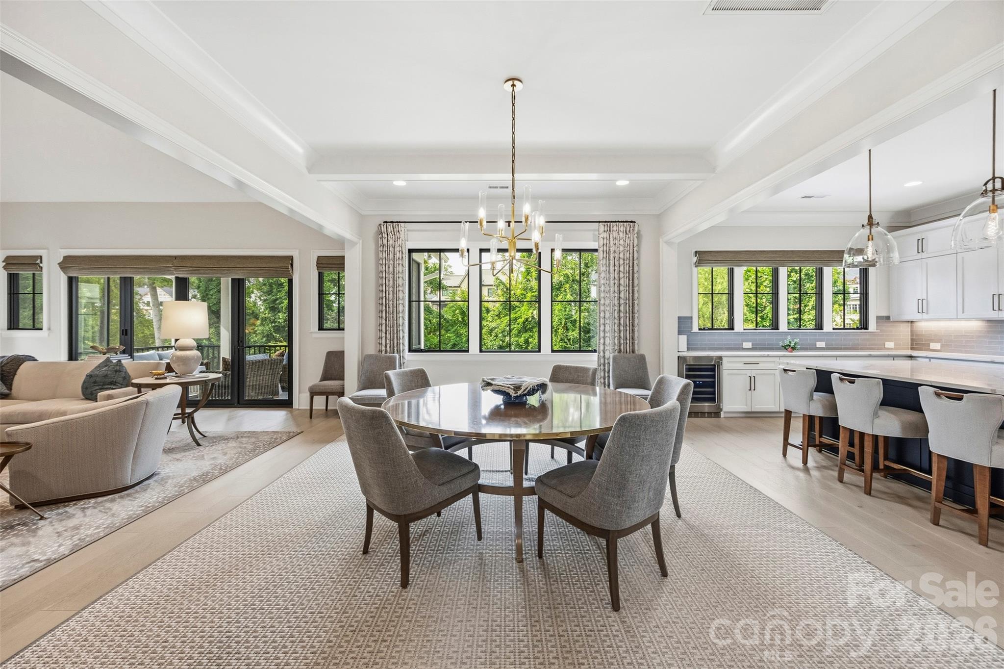 Open floor plan with custom window treatments throughout. - 6222 Louis Patrick Lane, Charlotte
