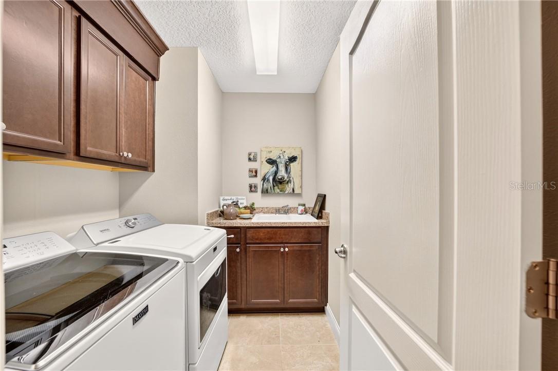 Laundry Room with Wet Sink and Cabinets - 3464 N Vonnegut PT, BEVERLYHILLS FL 34465, Beverly Hills