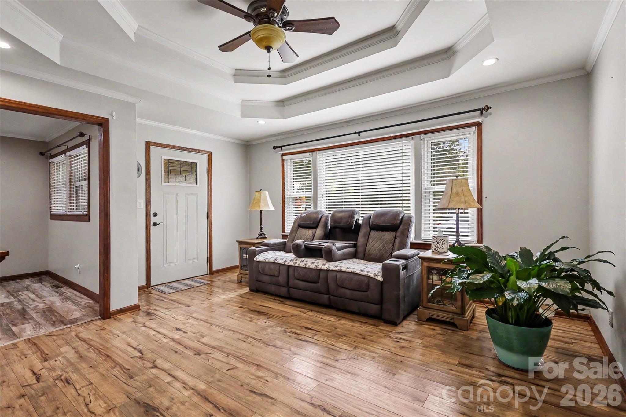 Living Room with Tray Ceiling and updated floors - 9202 Elgin Drive, Charlotte