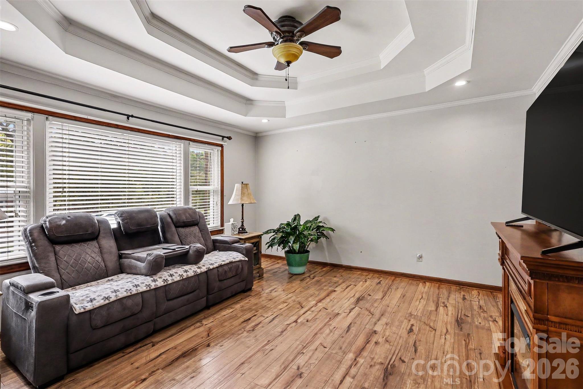Living Room with Tray Ceiling and updated floors - 9202 Elgin Drive, Charlotte