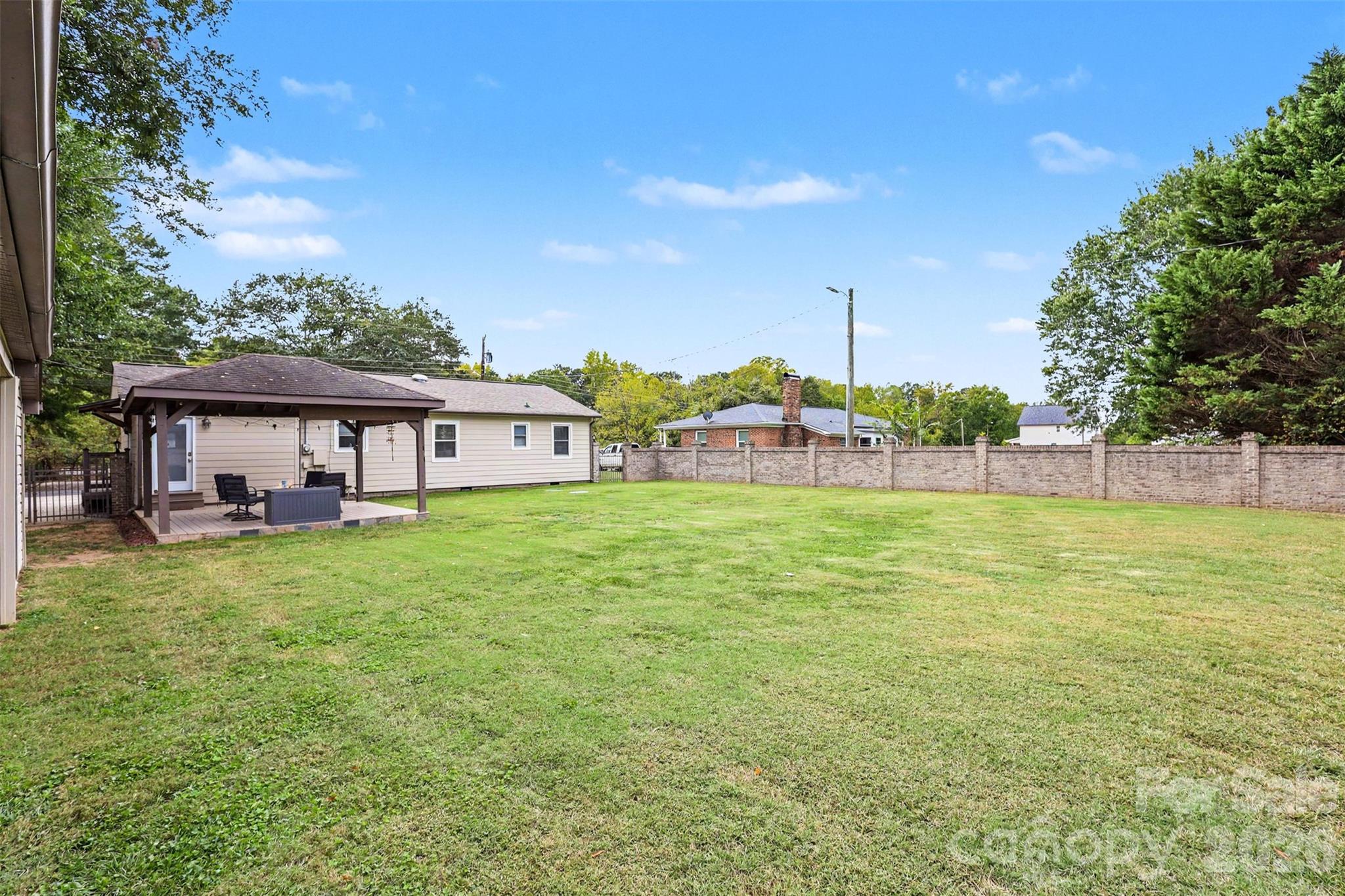 Backyard view with Gazebao - 9202 Elgin Drive, Charlotte