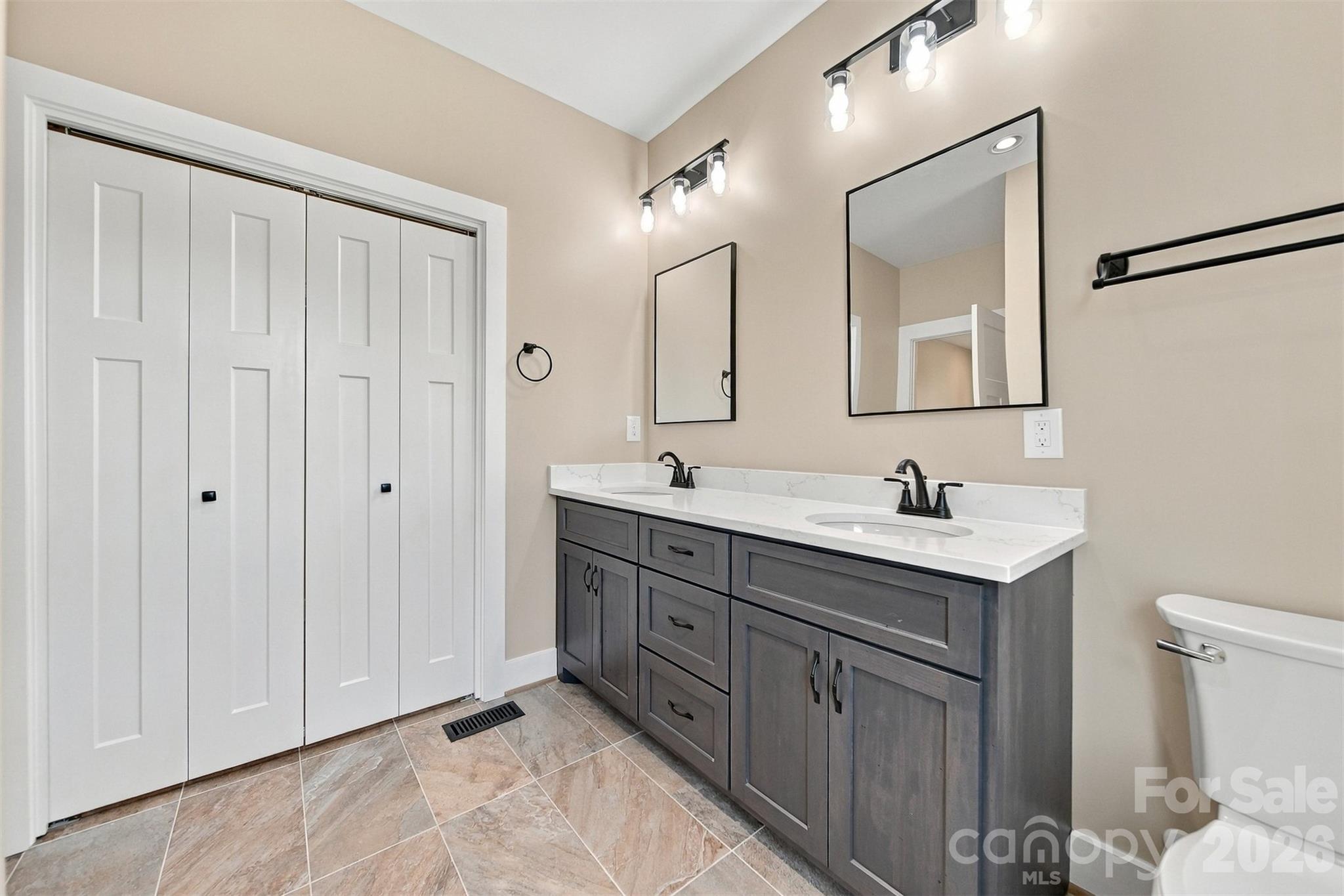 Primary bath and large walk in closet - 2937 Frank Whisnant Road, Morganton