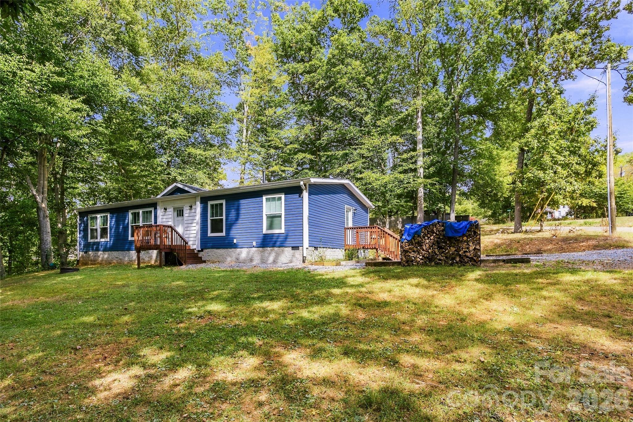 Single Family Residence at 203 Beaverdam Loop Road, Candler, photo 5 of 47