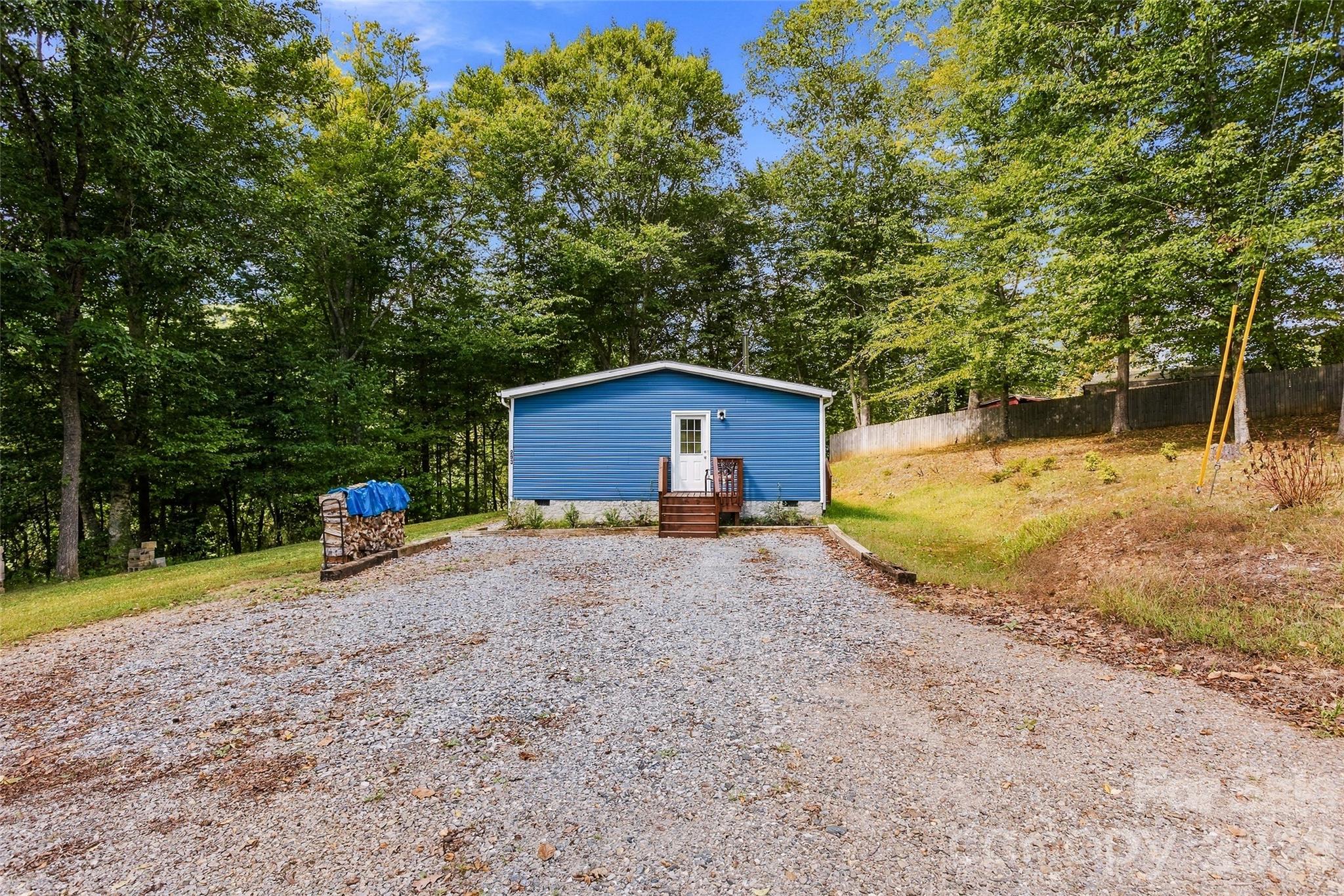 Single Family Residence at 203 Beaverdam Loop Road, Candler, photo 44 of 47