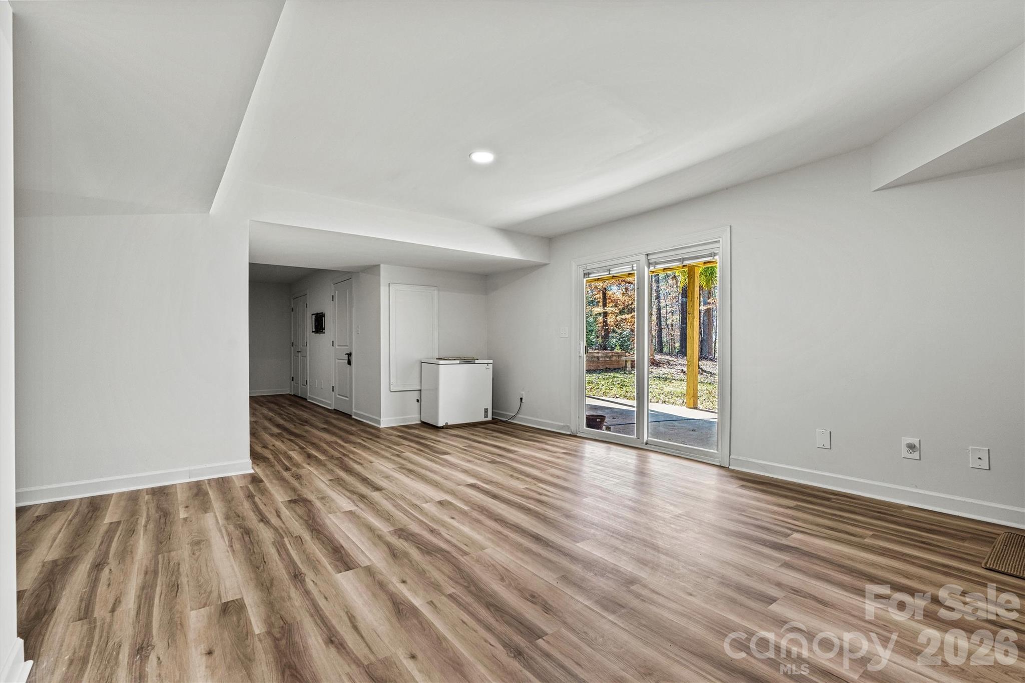 Walk-out from the absement right to the backyard - 3995 Burton Lane, Denver