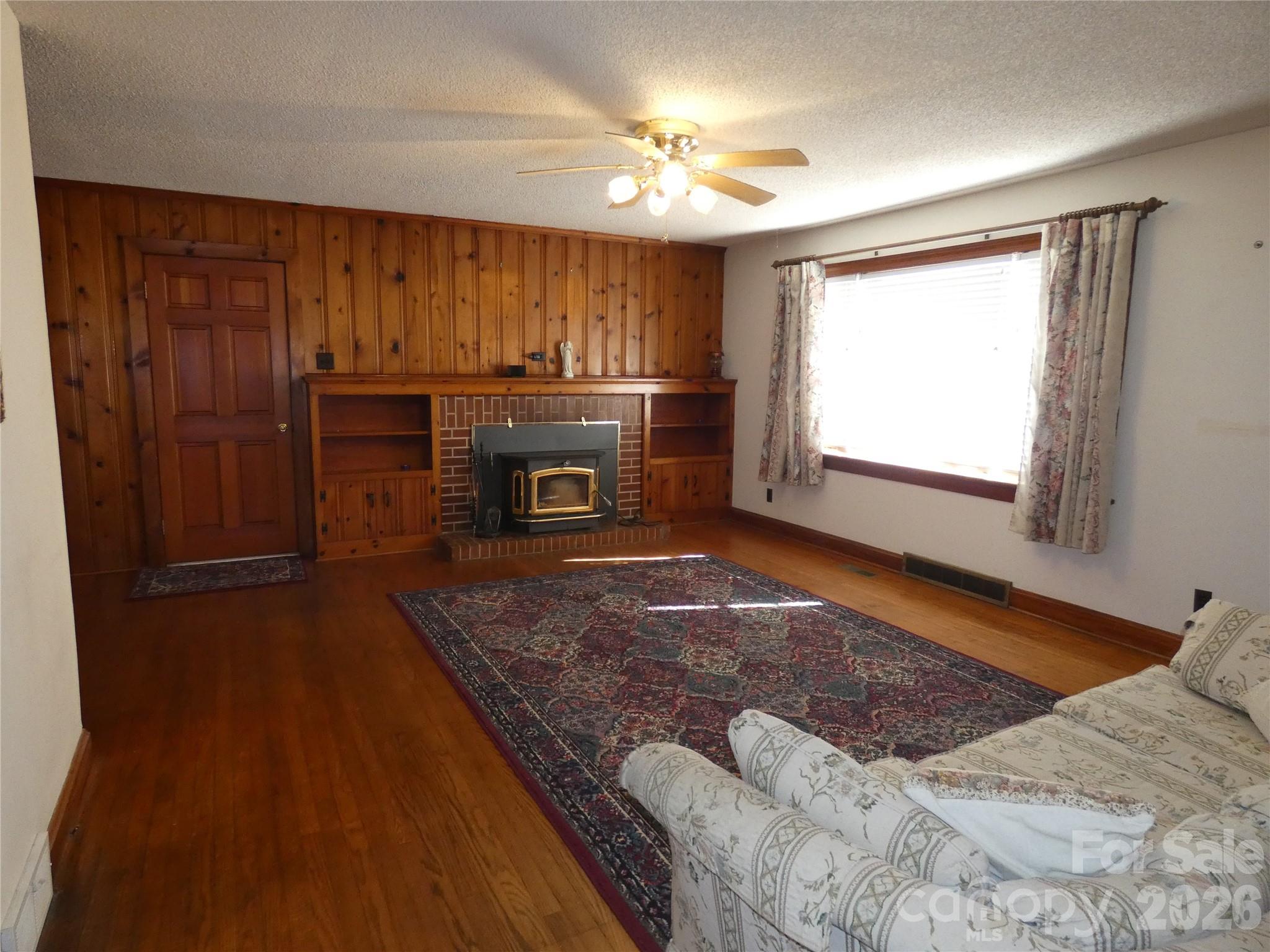 Living Room with Woodstove - 150 Fonda Road, Statesville