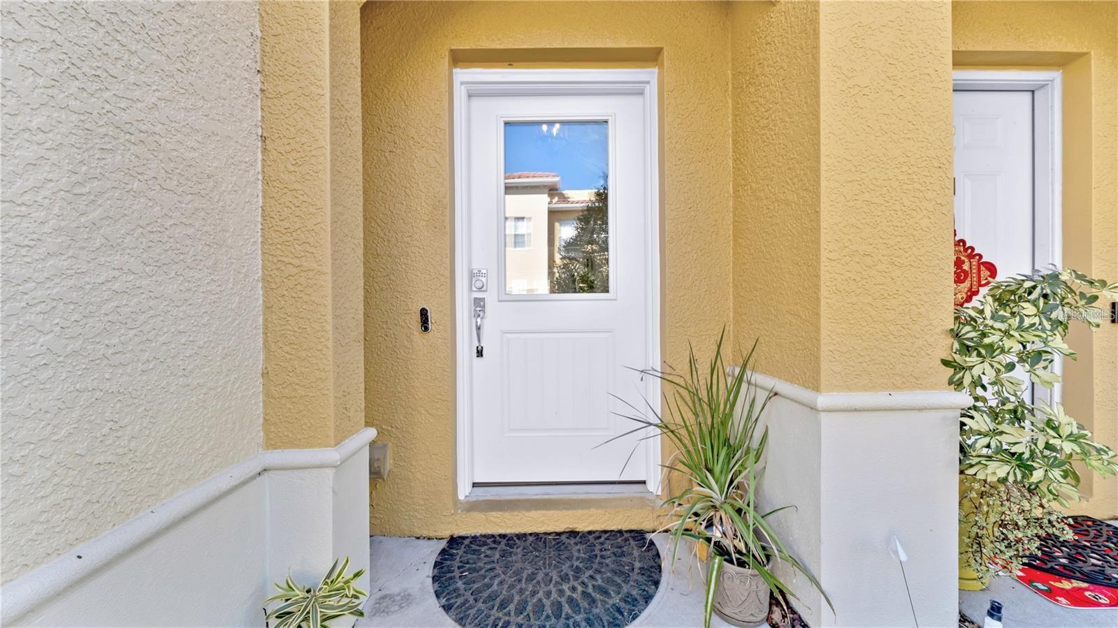 Newer front door-welcome in. - 614 105TH LN N, ST PETERSBURG