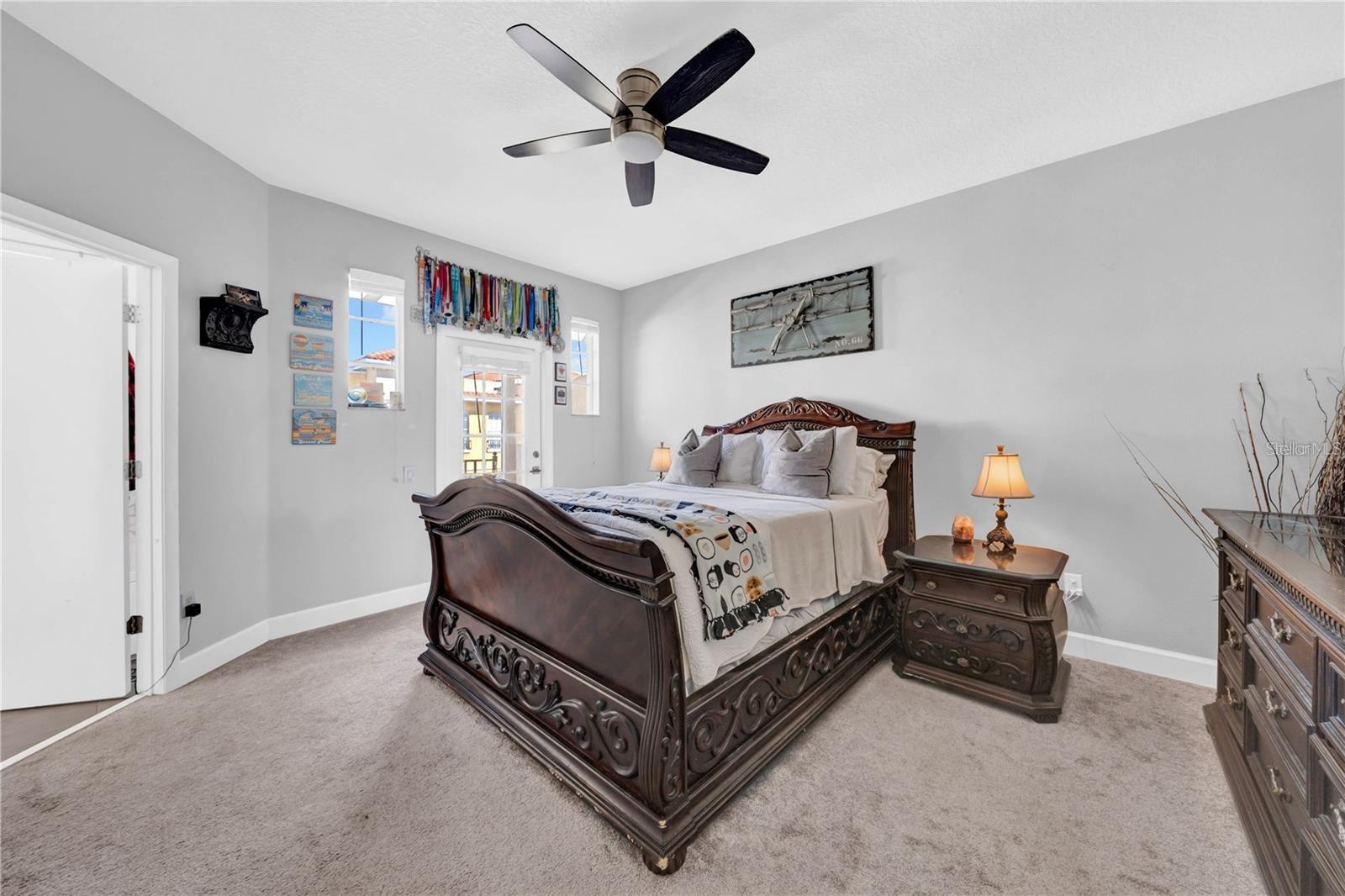 Primary Bedroom with Access to Private Balcony - 614 105TH LN N, ST PETERSBURG
