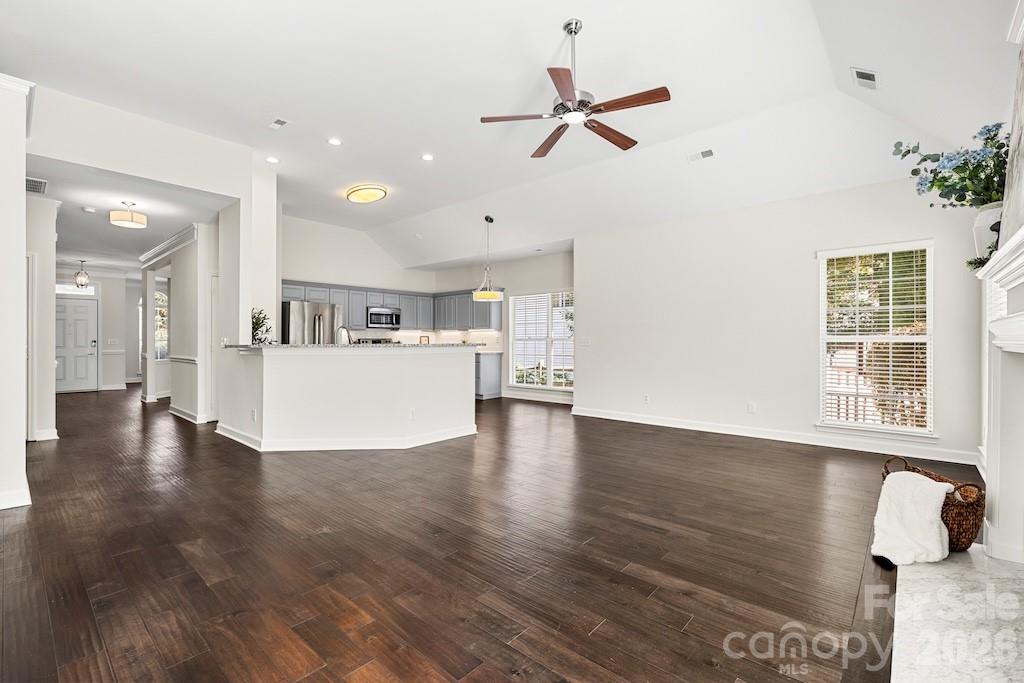 Open Floor Plan - Greatroom and kitchen view and beautiful wood floors - 109 Coronilla Road, Mooresville